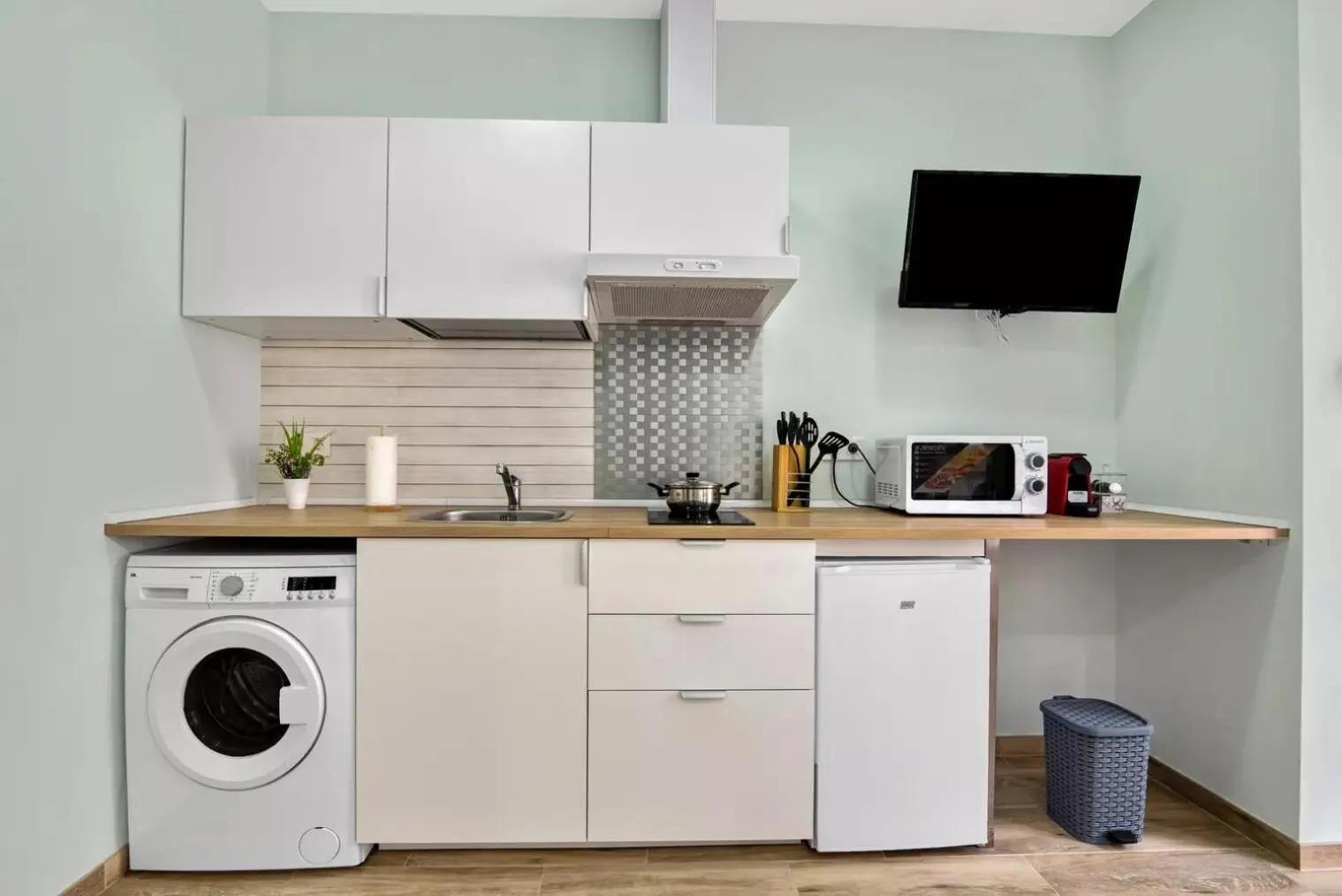 Kitchen or kitchenette in Umihouse apartamentos centro Alicante