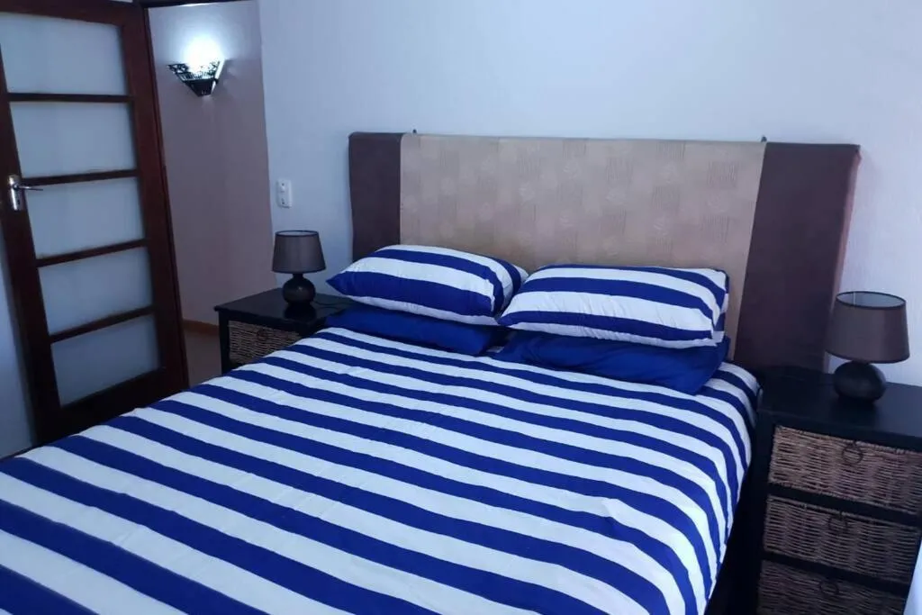 Bed in 23 Manzini Chalets-Pumba's Den