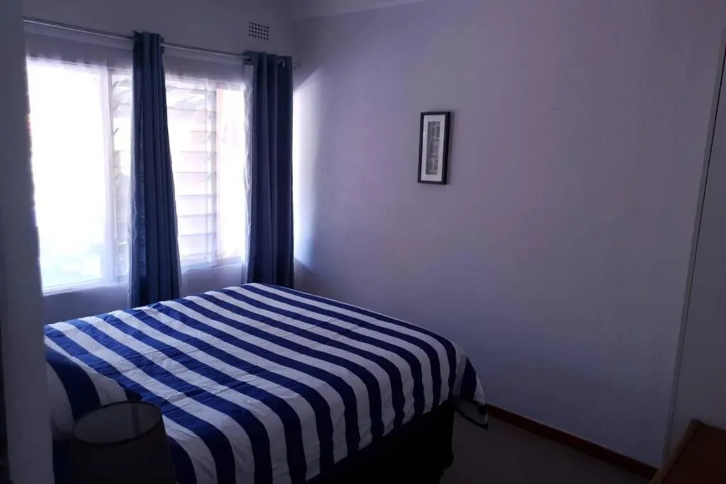 Bed in 23 Manzini Chalets-Pumba's Den