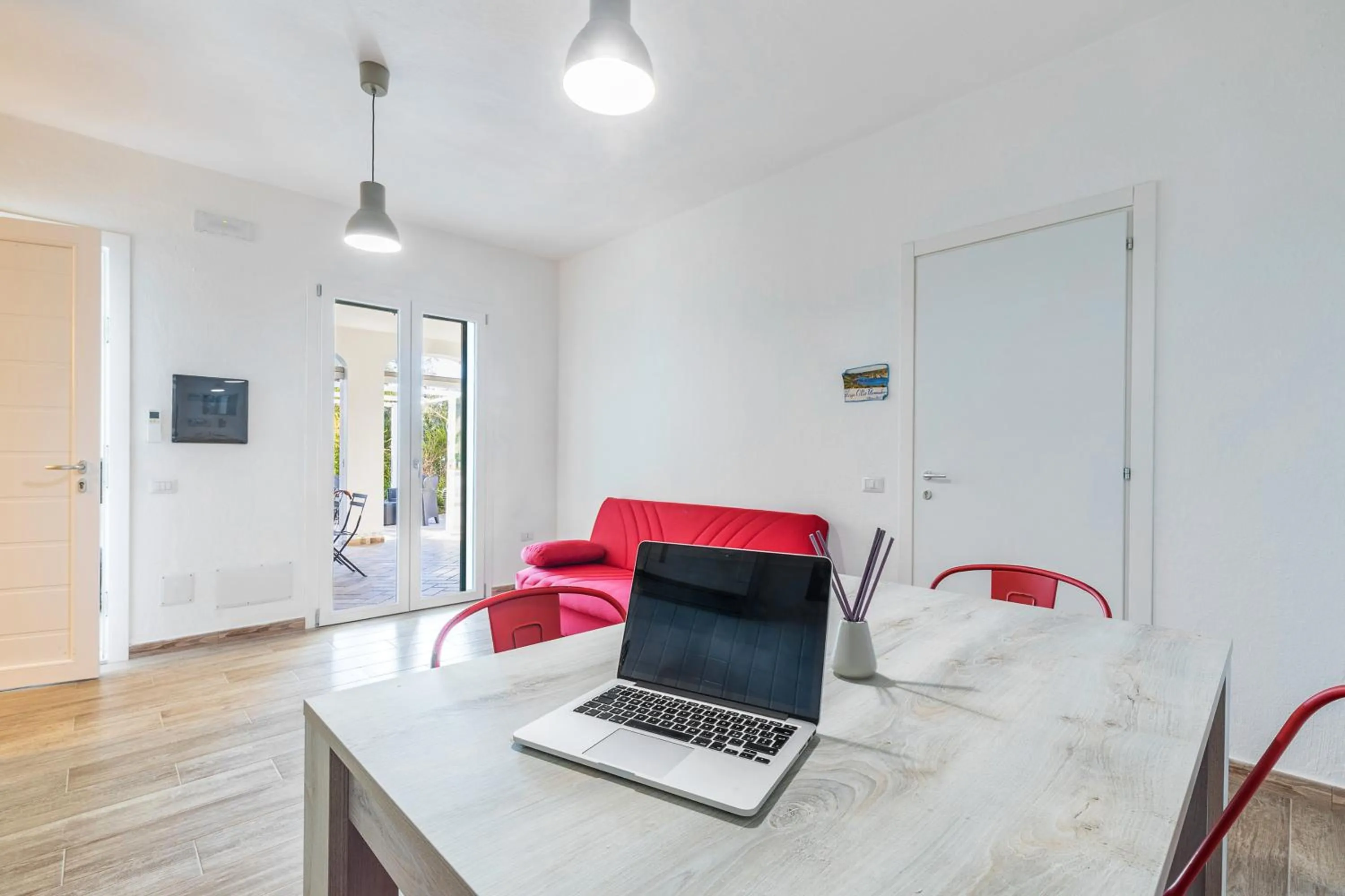 Living room, Bed in Acquazzurra Affittacamere