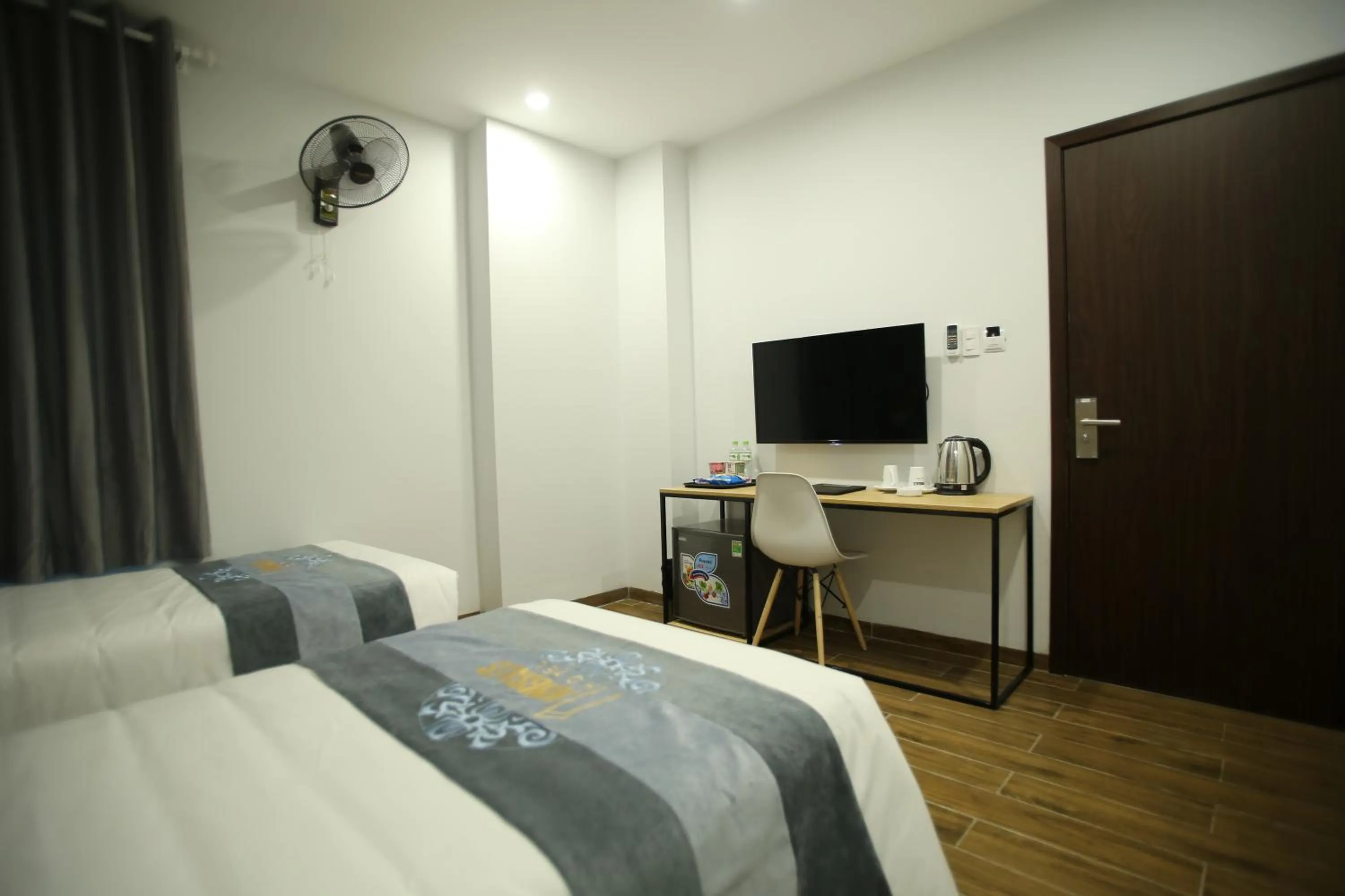 Bed in KingSales Hotel