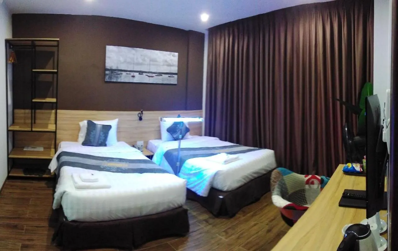 Bed in KingSales Hotel