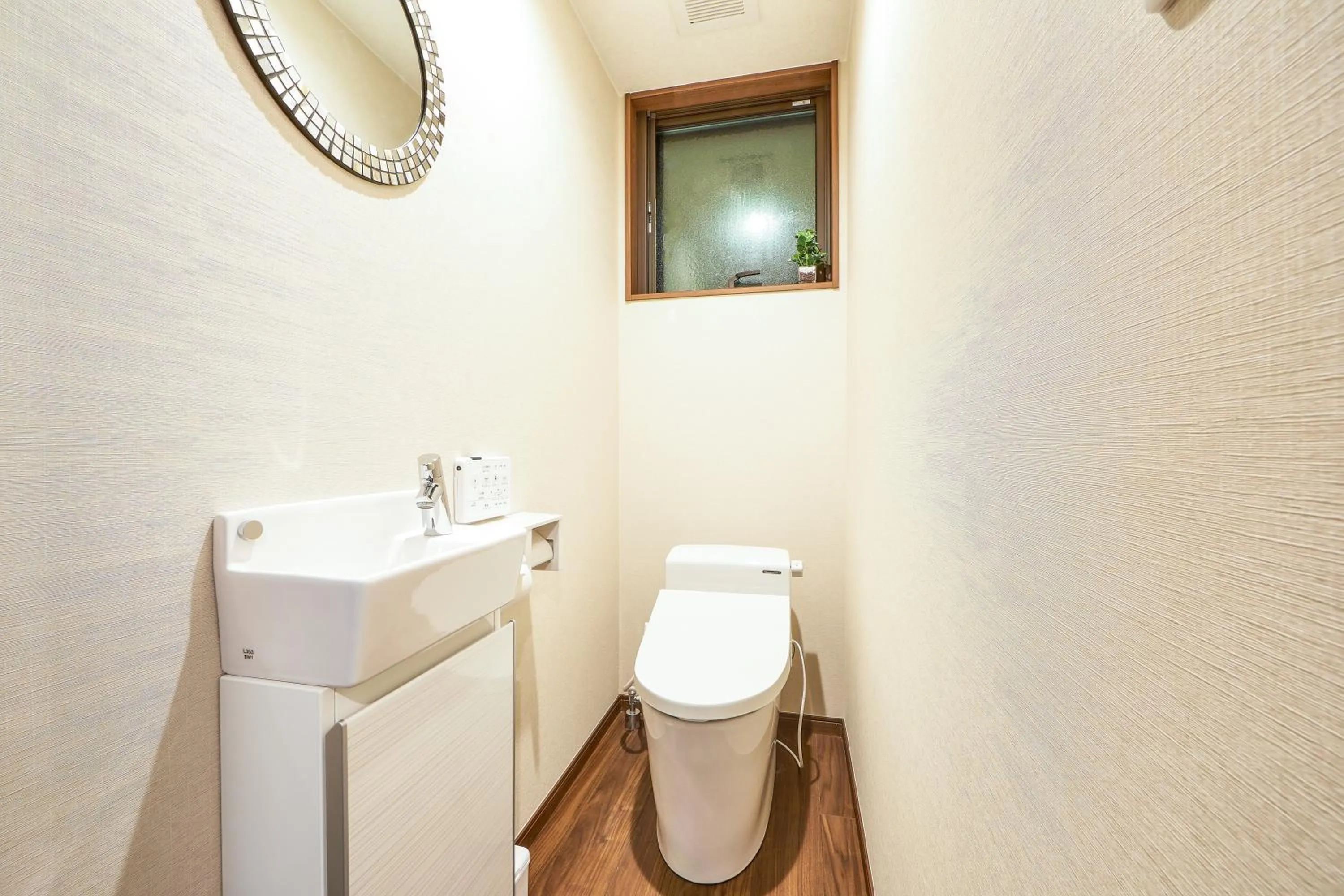 Toilet in E-horizon Resort コンドミニアム名護B