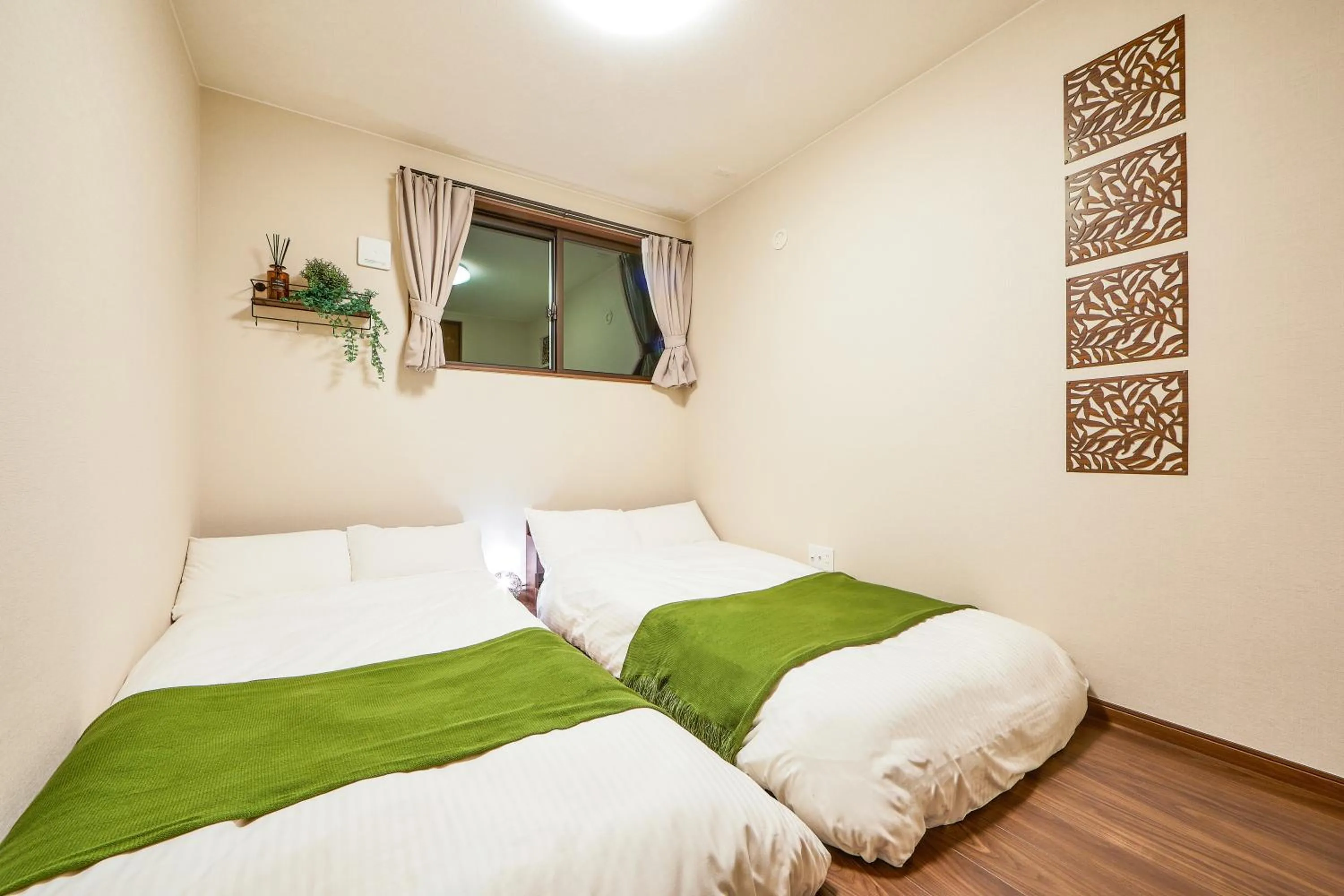 Bed in E-horizon Resort コンドミニアム名護B