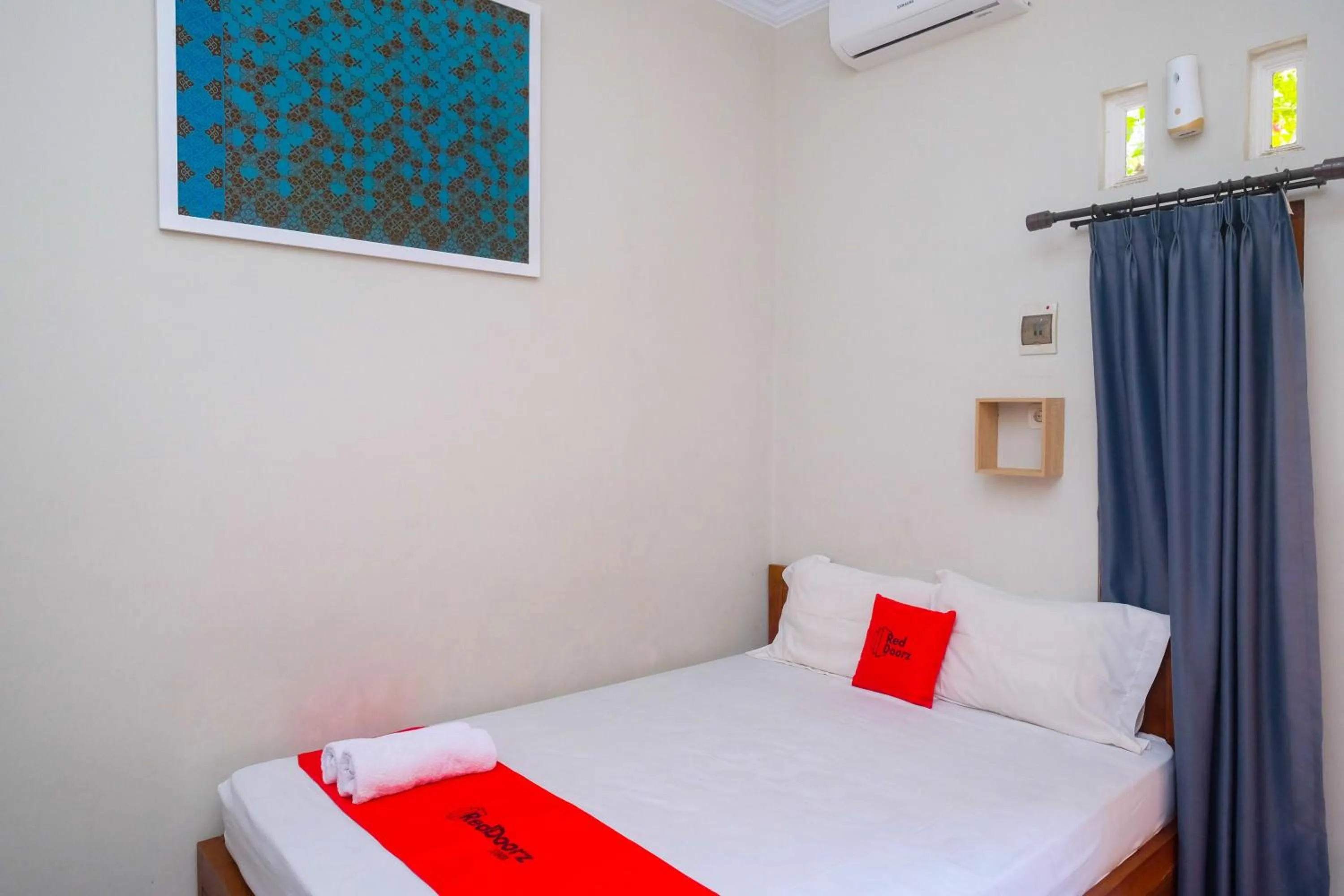 Bed in RedDoorz Syariah near Pascasarjana UGM 3