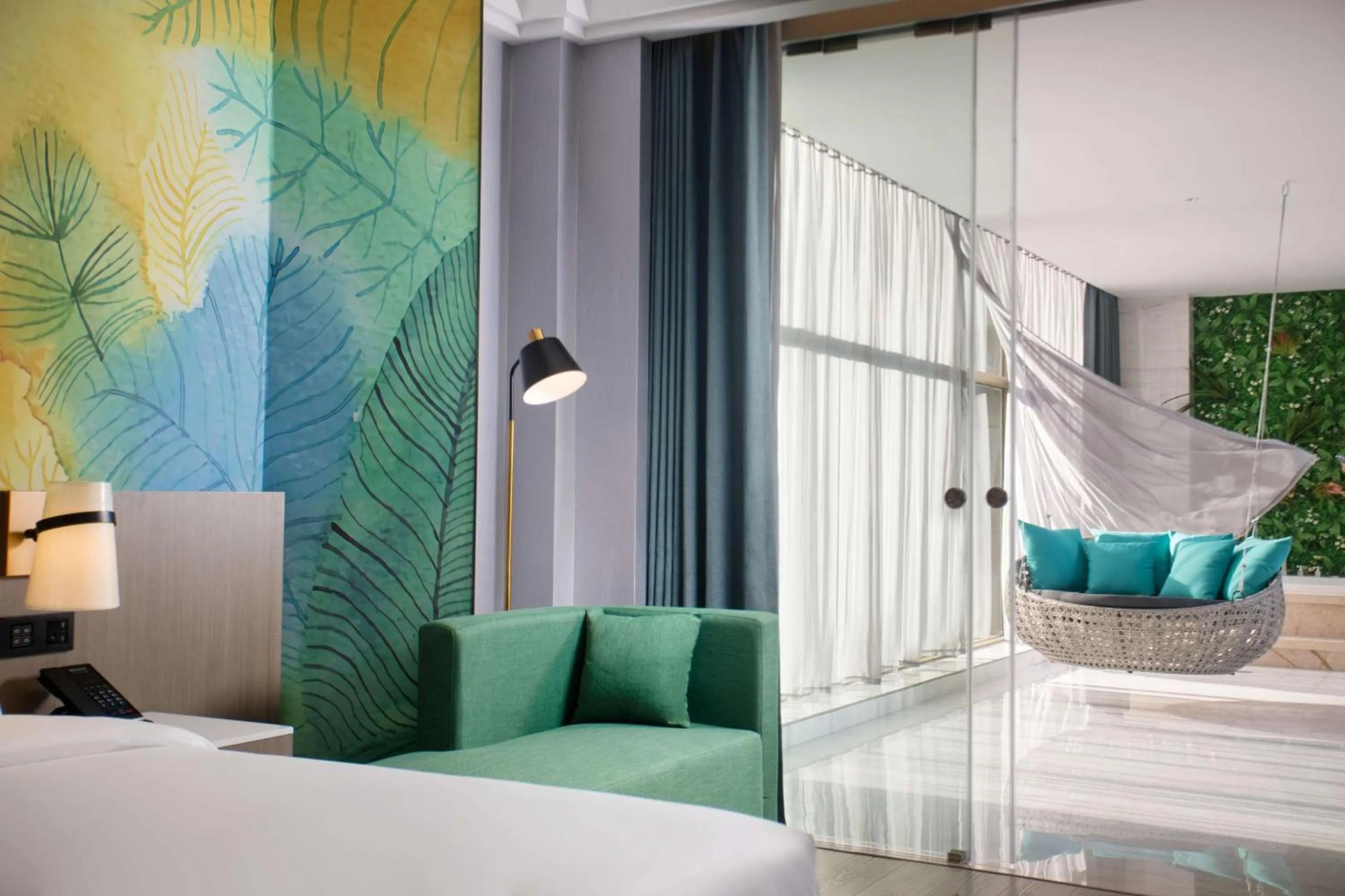 Photo of the whole room, Seating Area in Ramada Encore by Wyndham Guangzhou South