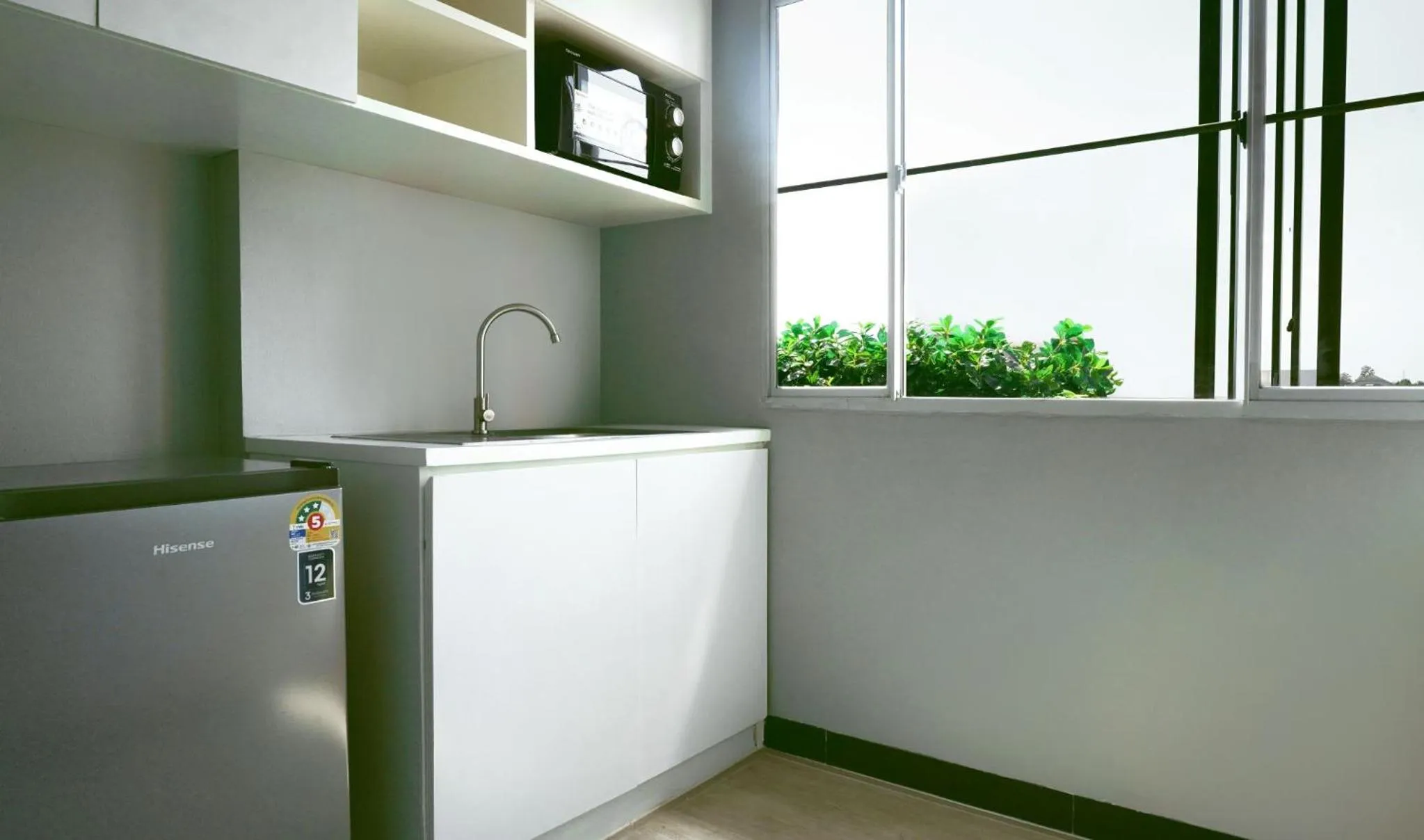 Kitchen or kitchenette in Fullroom 77 Srinakarin