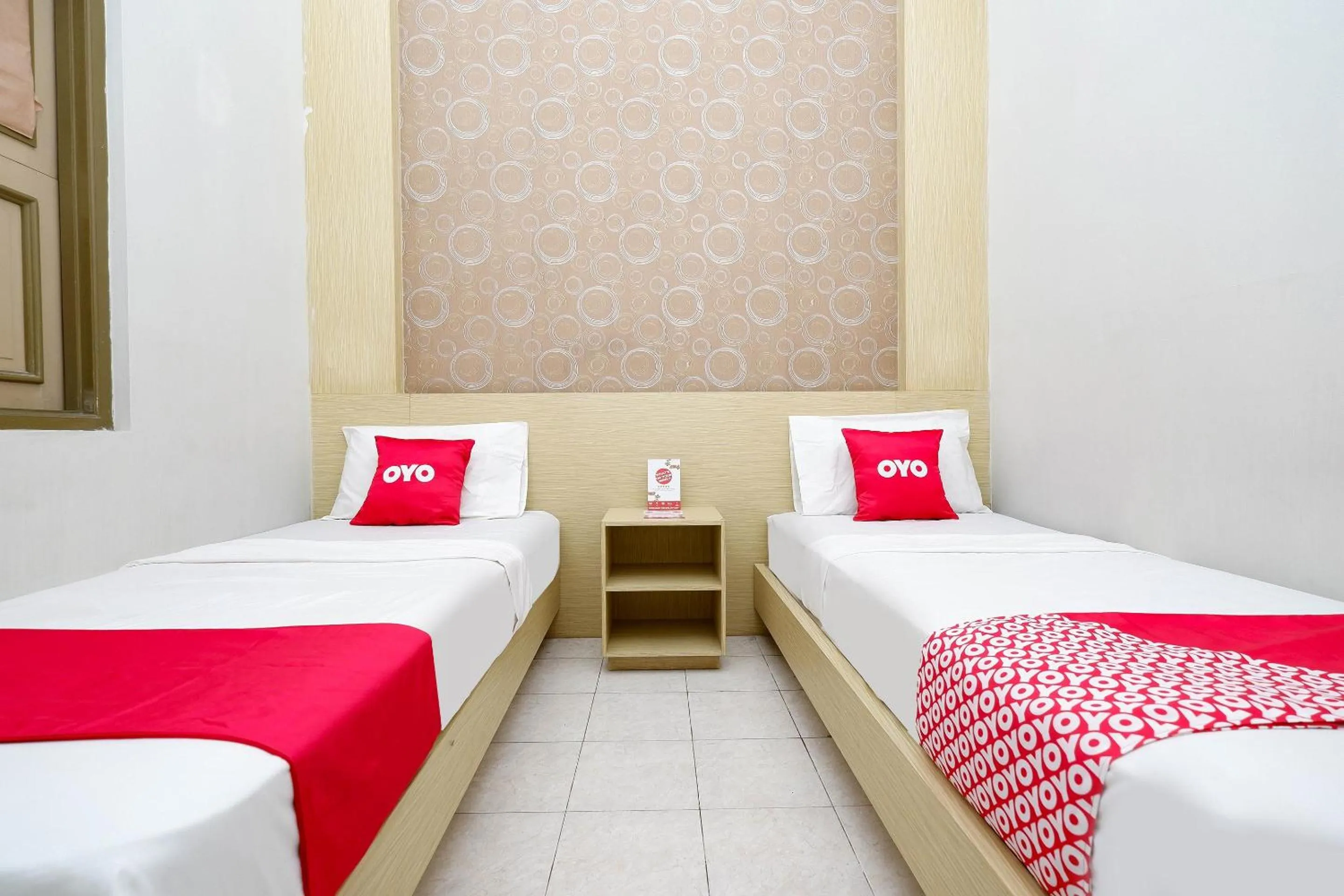 Bedroom in Super OYO 2436 Hotel Kencana