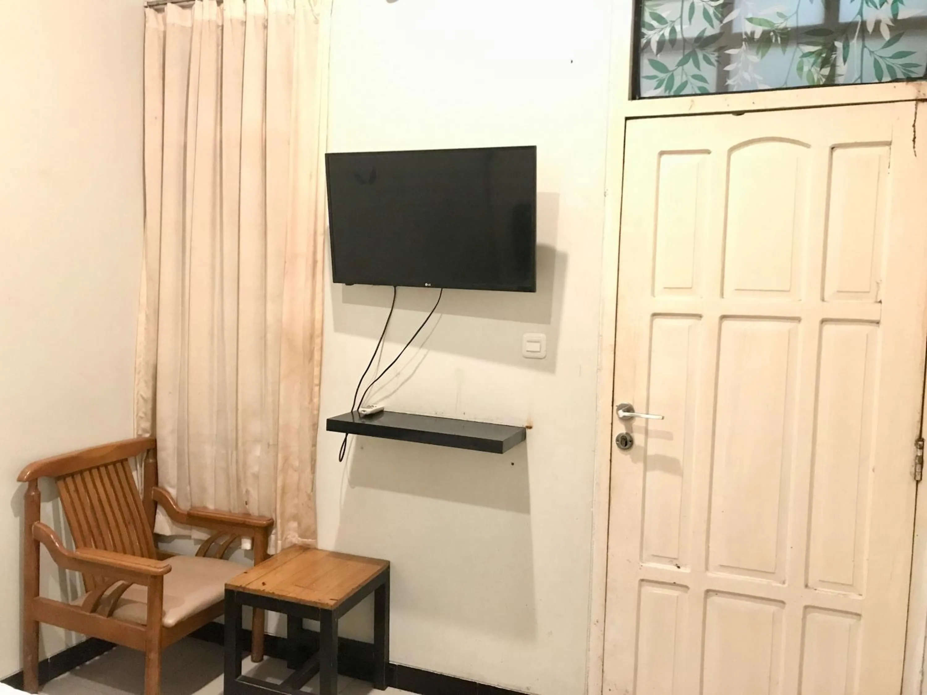 Bedroom in Gangnam Style Residence Mitra RedDoorz near MERR Surabaya