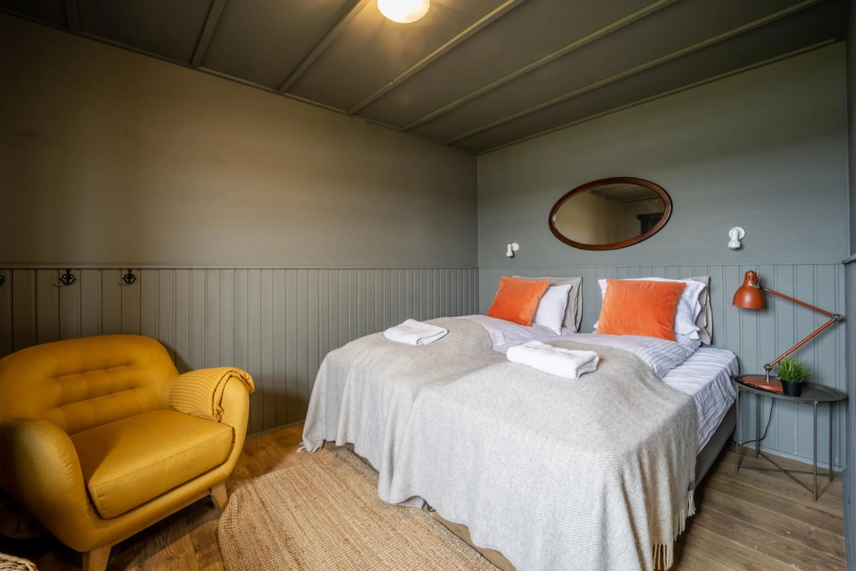 Bed in Riverfront Lodge Hella