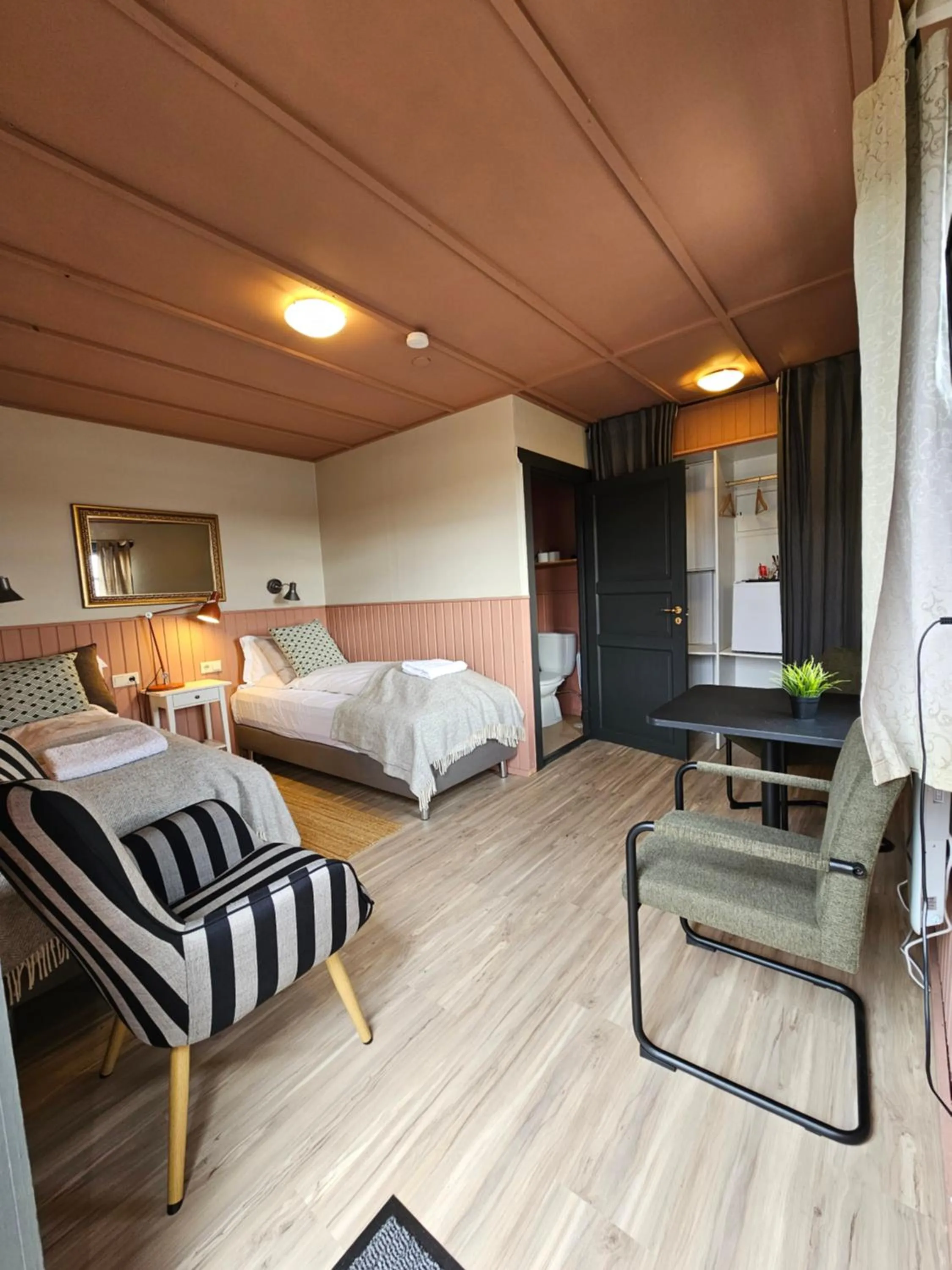 Photo of the whole room, Bed in Riverfront Lodge Hella