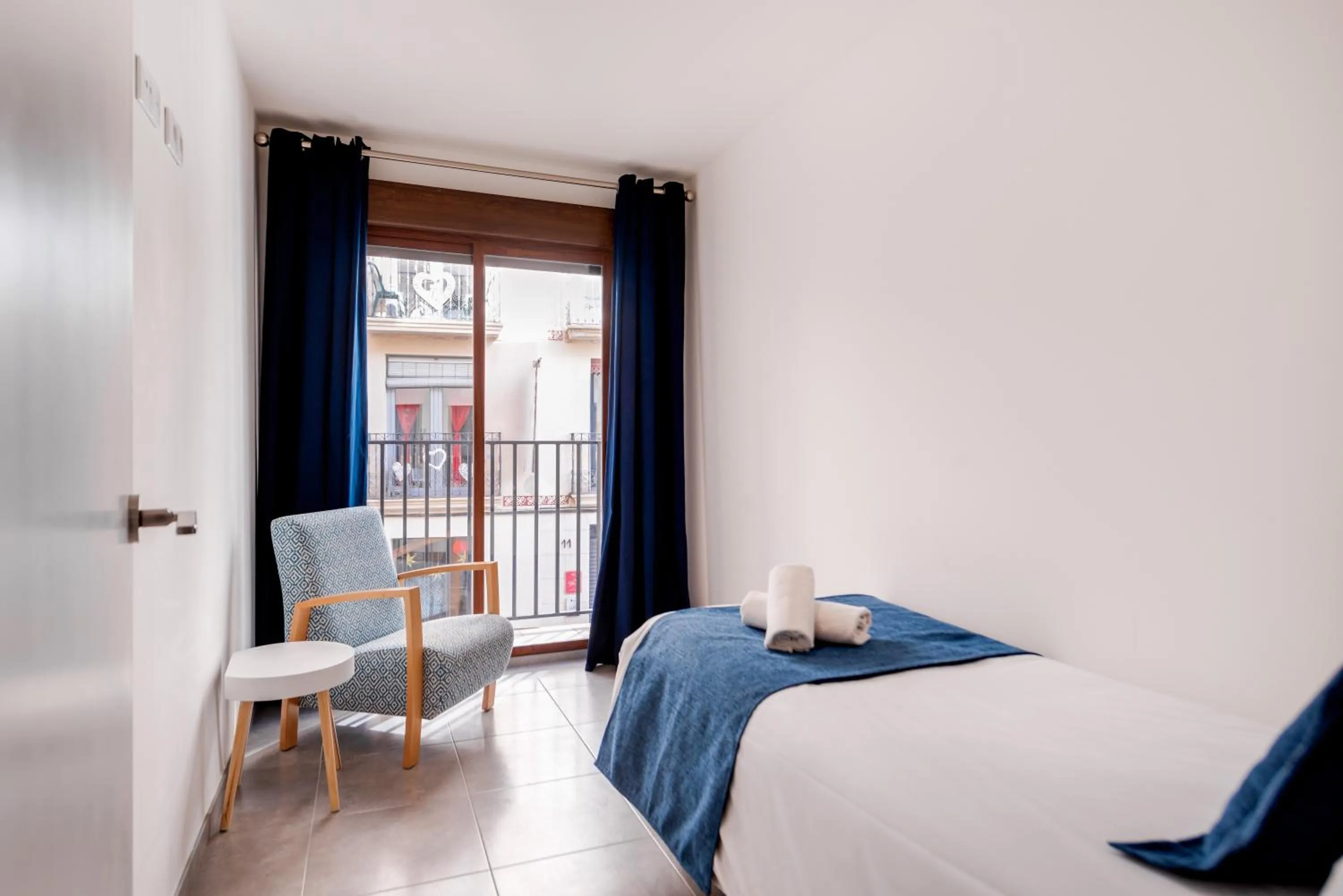 Bed in Apartamentos Quijano by Be Alicante