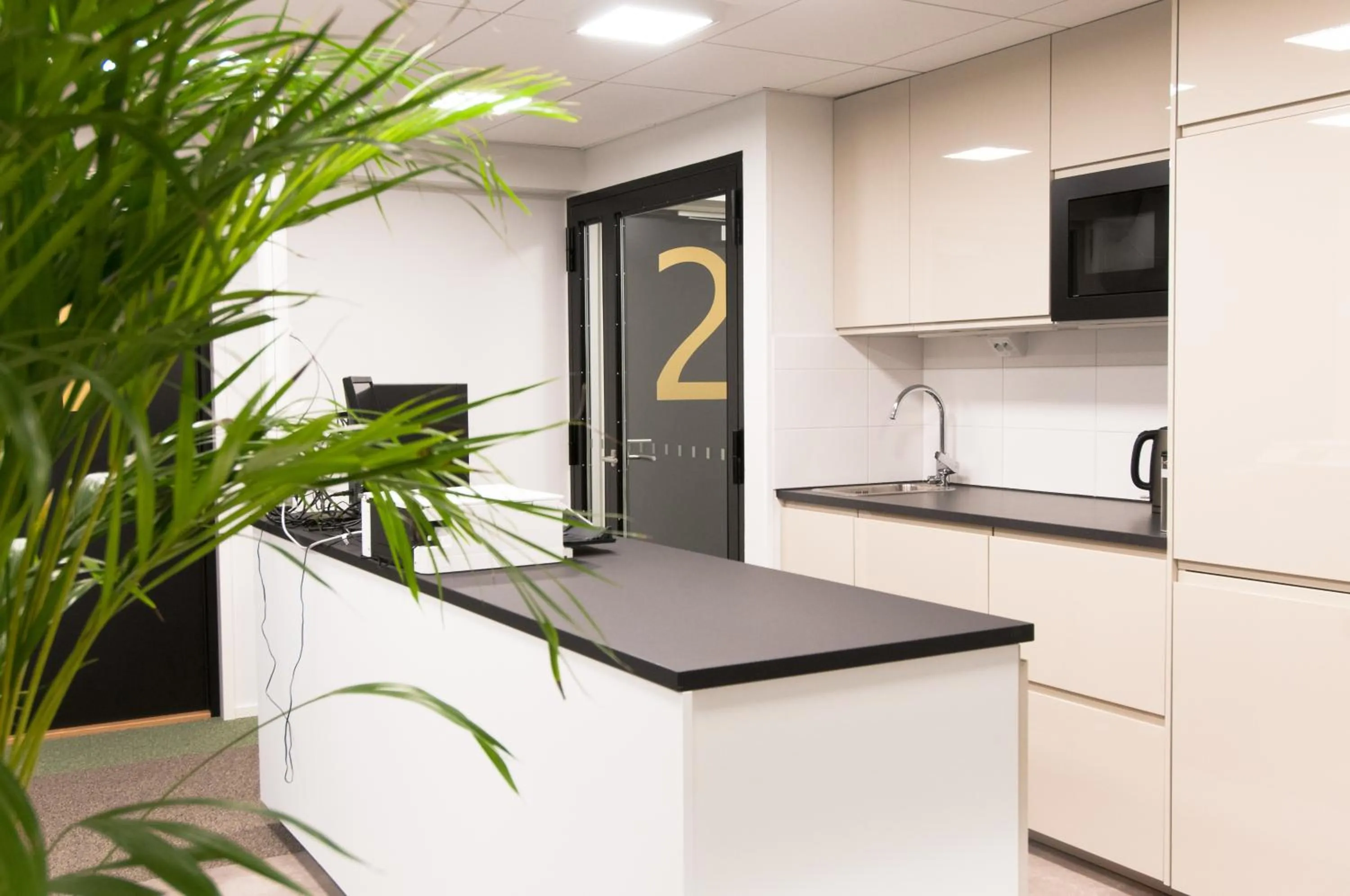 Kitchen or kitchenette in Aikatalo Hostel Helsinki