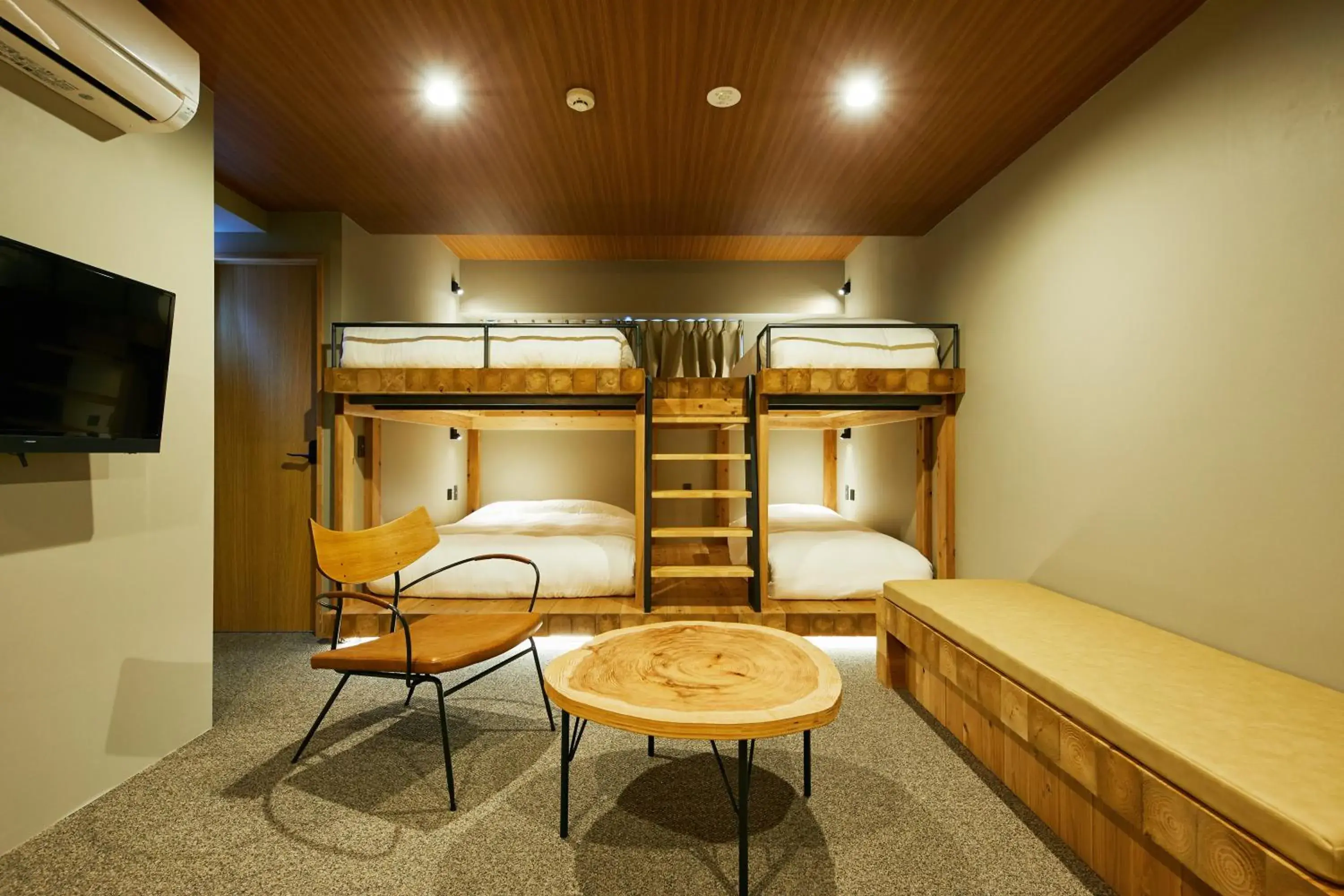 Seating area, Bed in mizuka Daimyo 7 - unmanned hotel - Seating area, Bed in mizuka Daimyo 7 - unmanned hotel -
