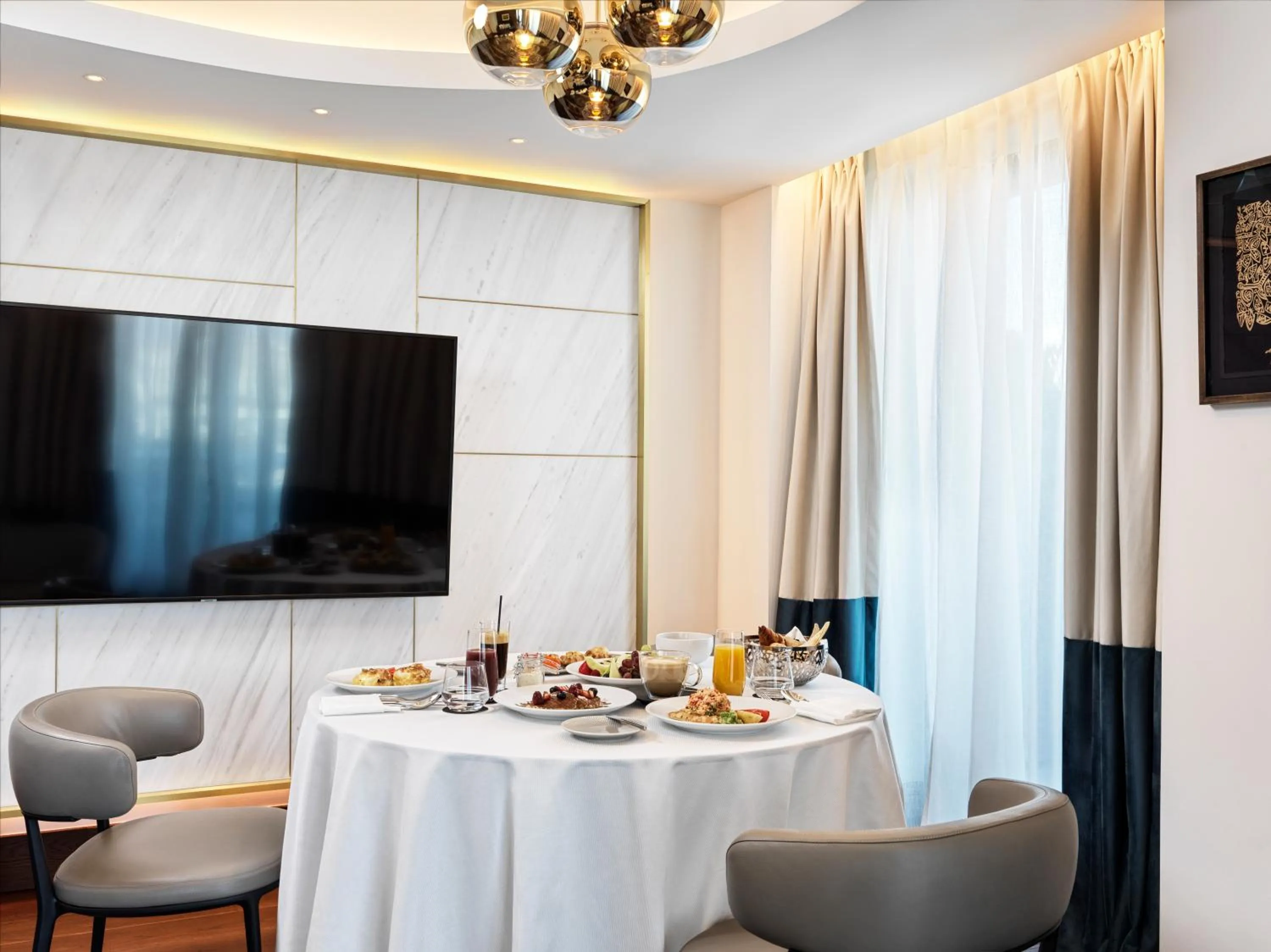 TV and multimedia in Athens Capital Center Hotel - MGallery Collection