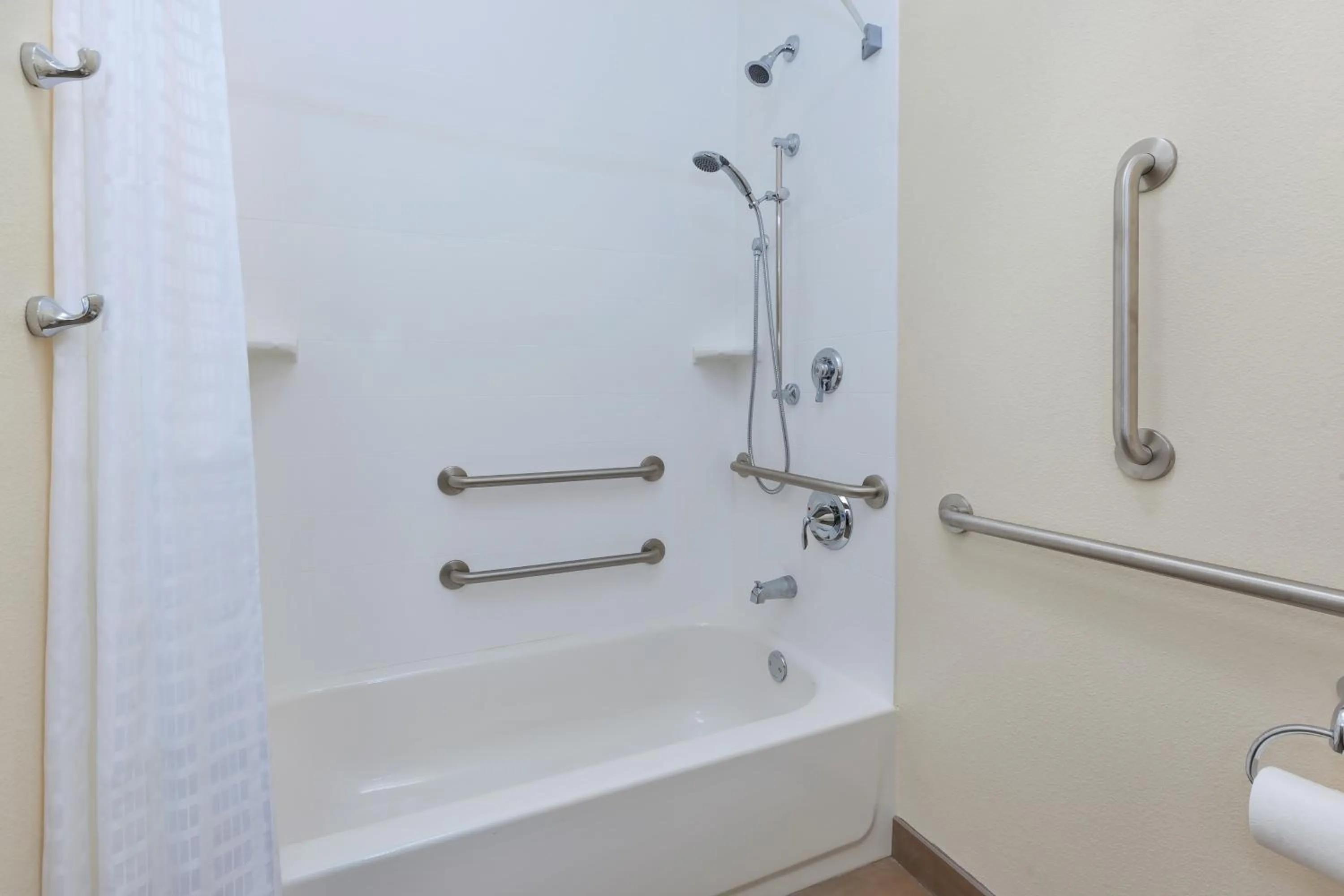 Shower in Candlewood Suites Louisville - NE Downtown Area by IHG