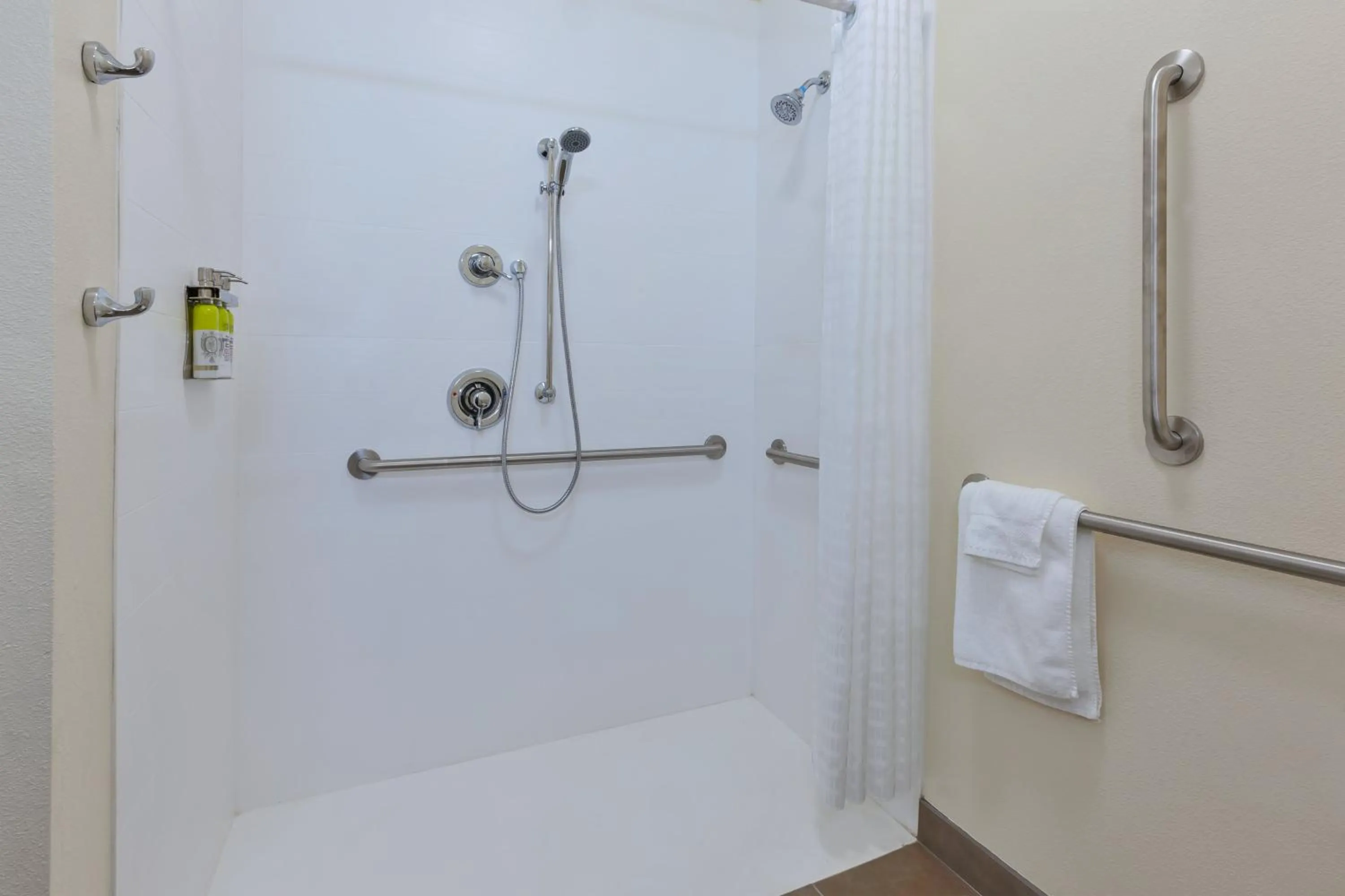 Bathroom in Candlewood Suites Louisville - NE Downtown Area by IHG