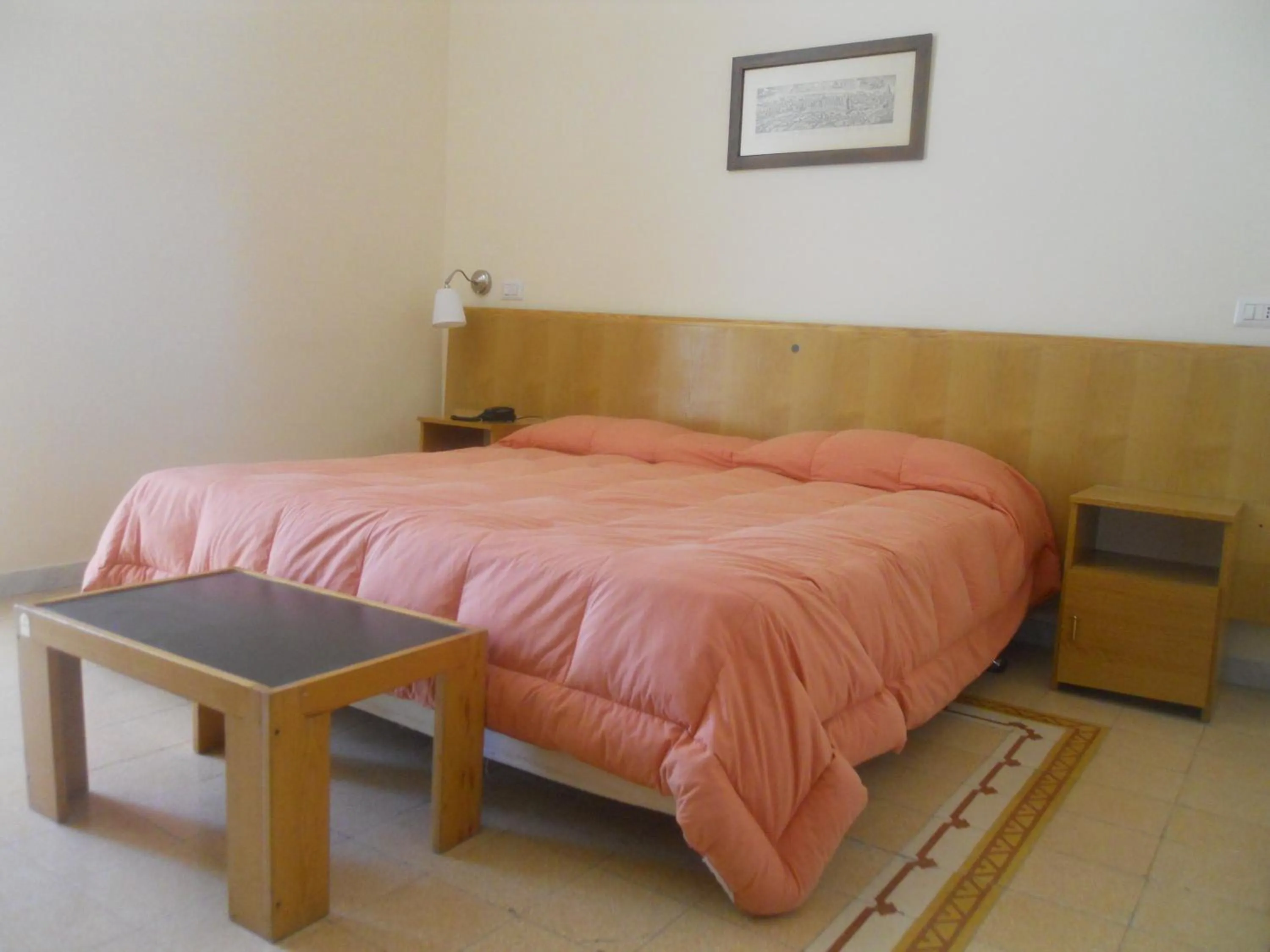 Bed in Albergo Santa Teresa