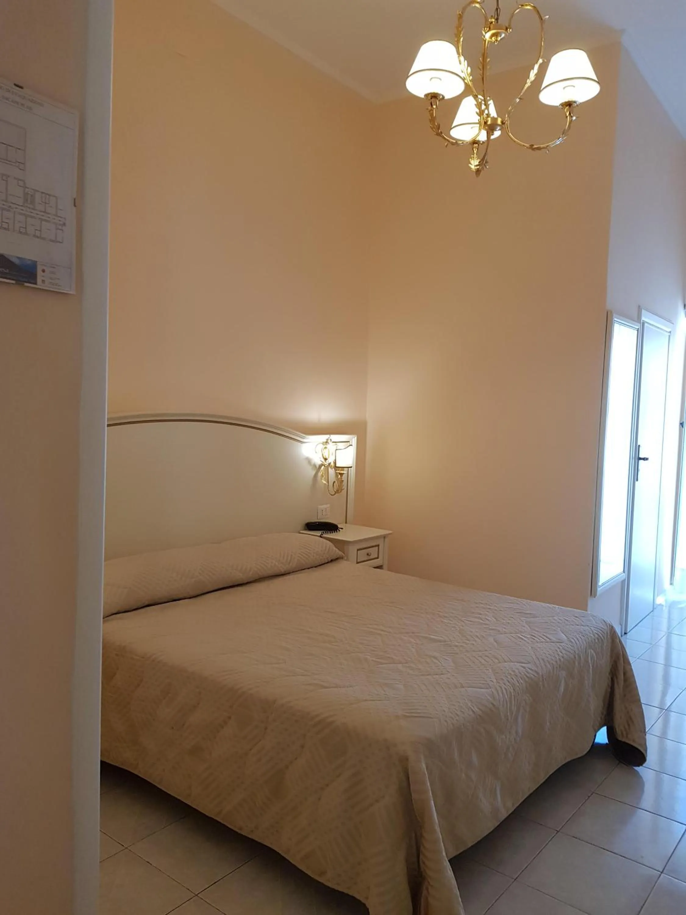 Bed in Albergo Santa Teresa