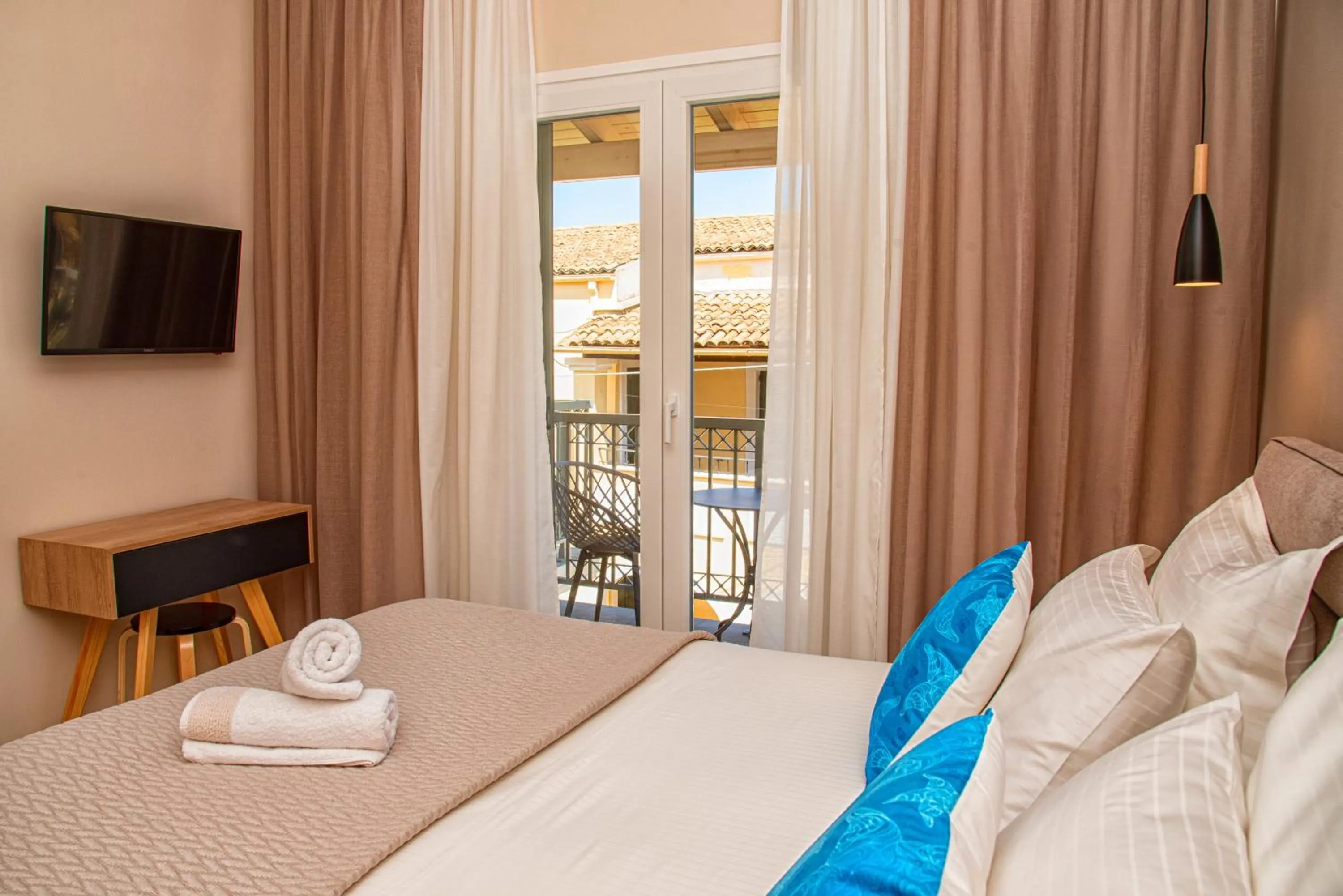 Bed in Kassiopi Luxury Suites