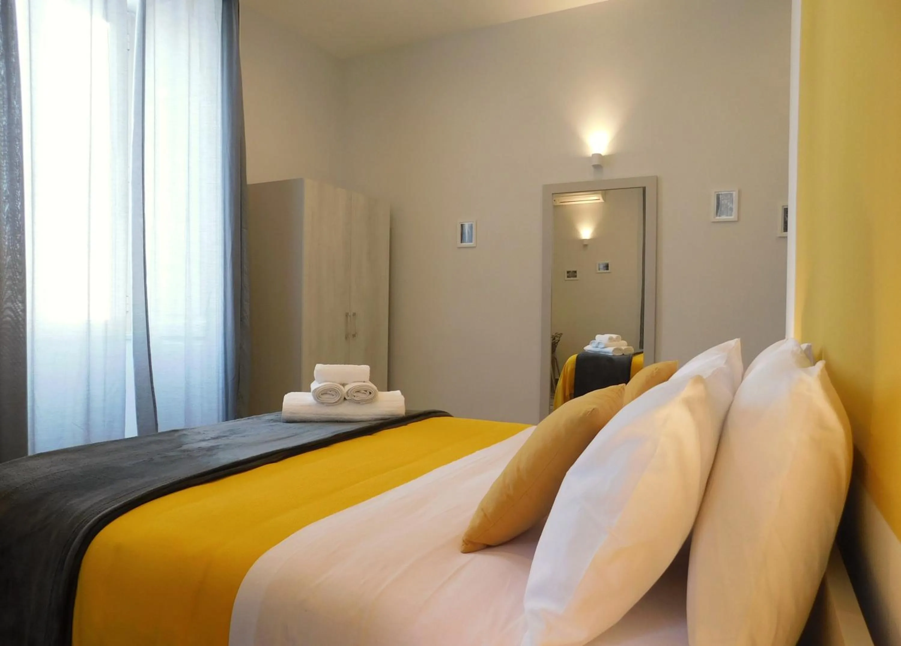 Bed in Scaramantico Rooms