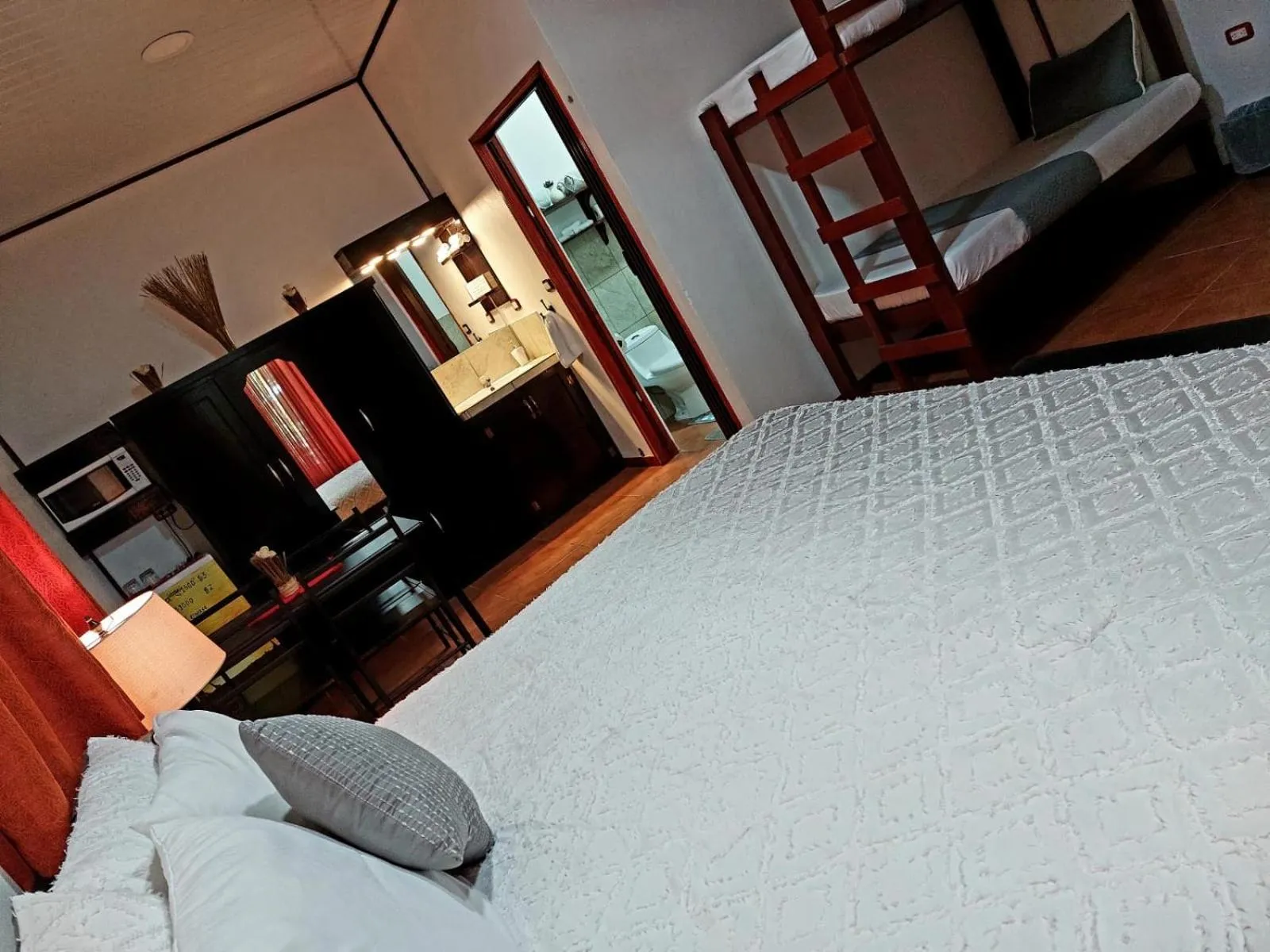 Bed in Hotel Casa Vito Beachfront