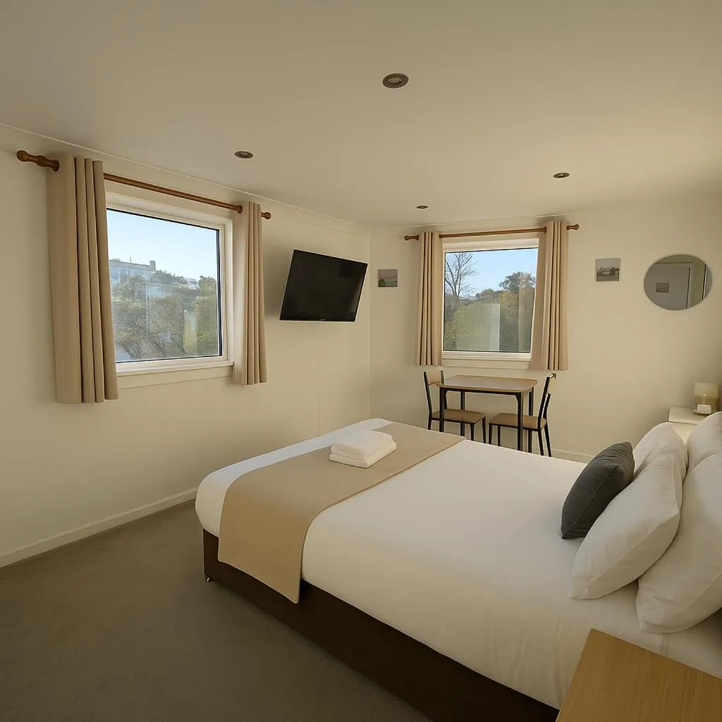 Photo of the whole room, Bed in Cecil Court Hotel