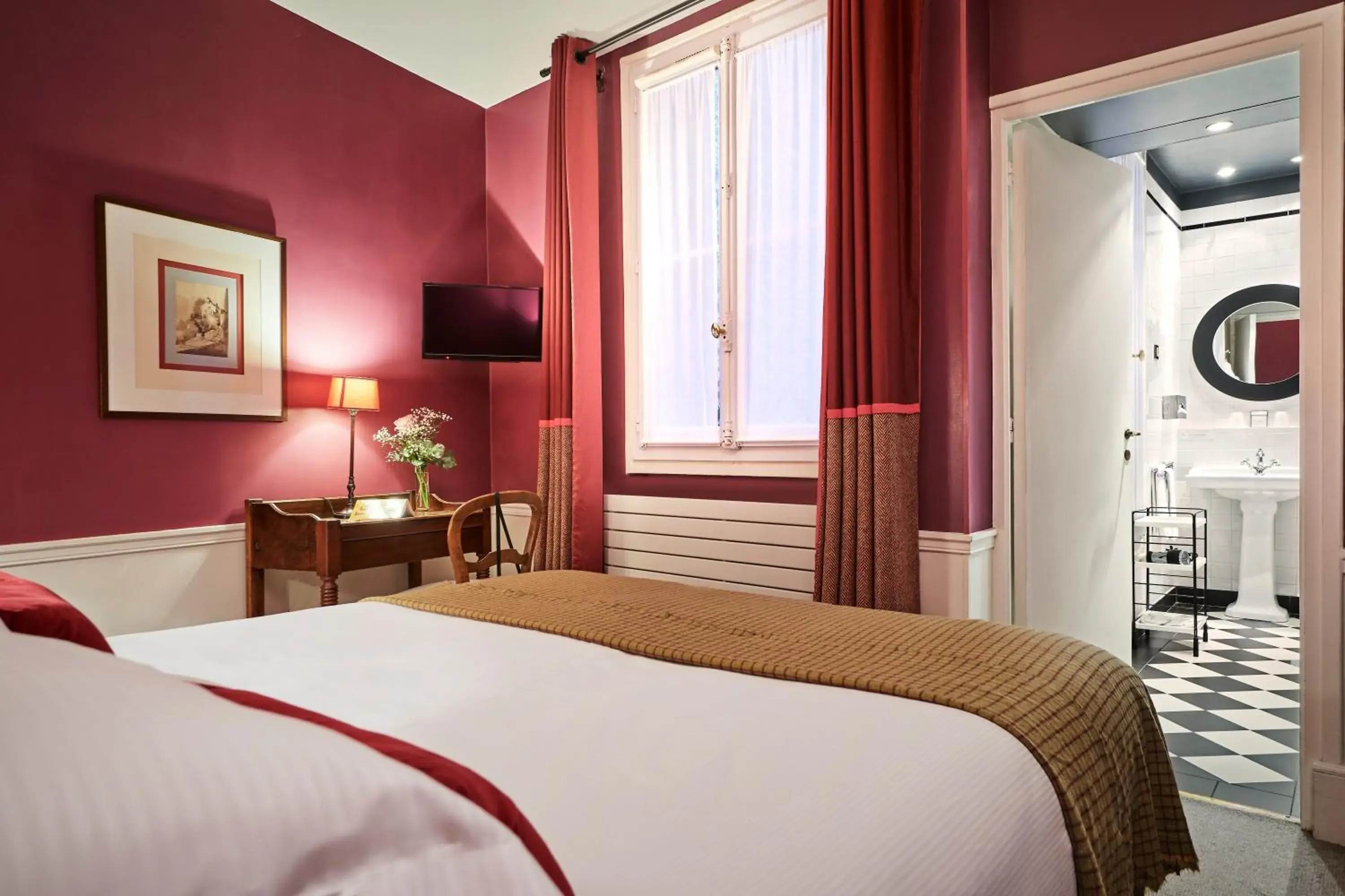 Bed in Hôtel Sainte-Beuve Bed in Hôtel Sainte-Beuve