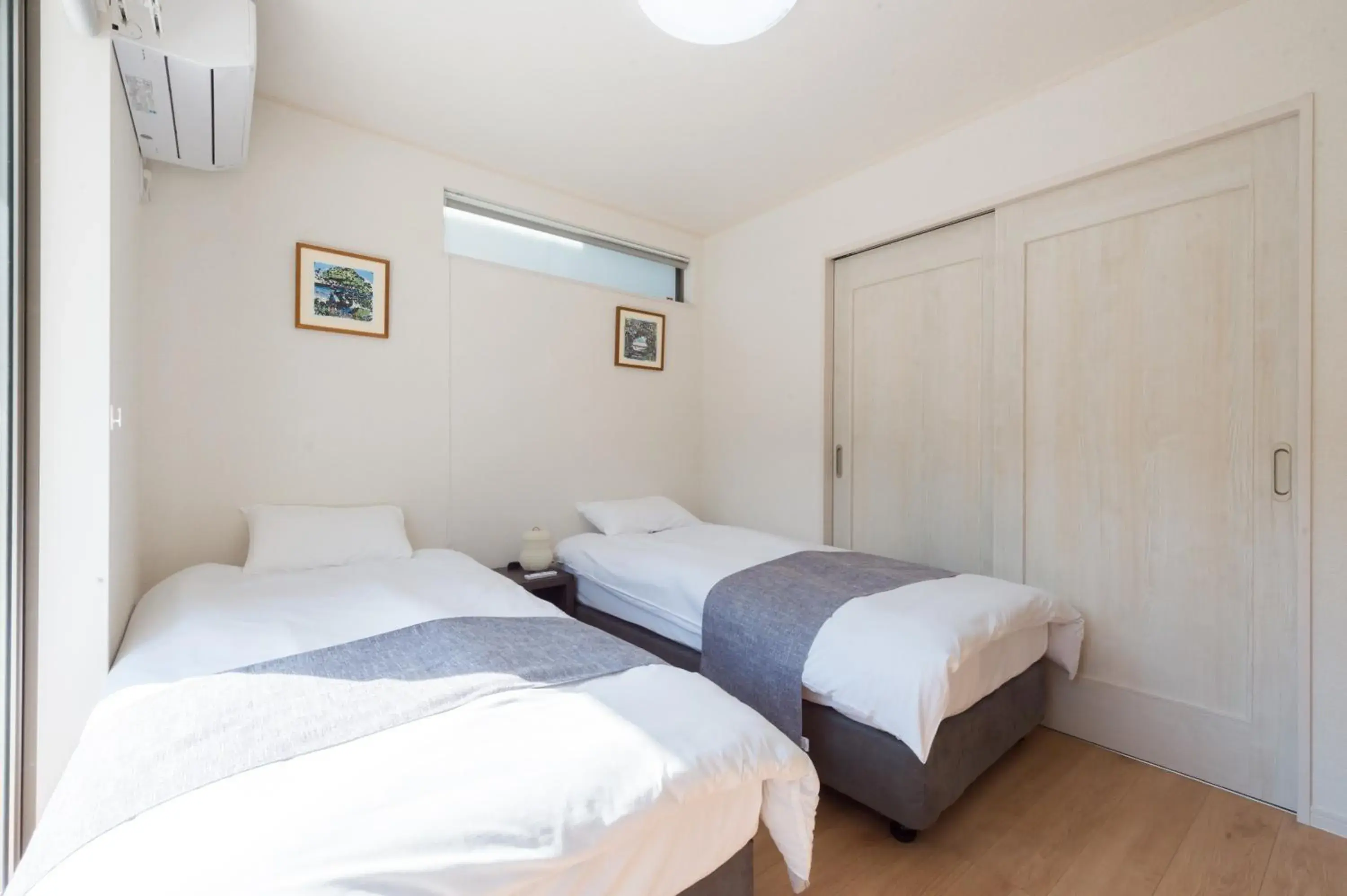 Bed in Riverside Yofuke AFP Villa Bed in Riverside Yofuke AFP Villa