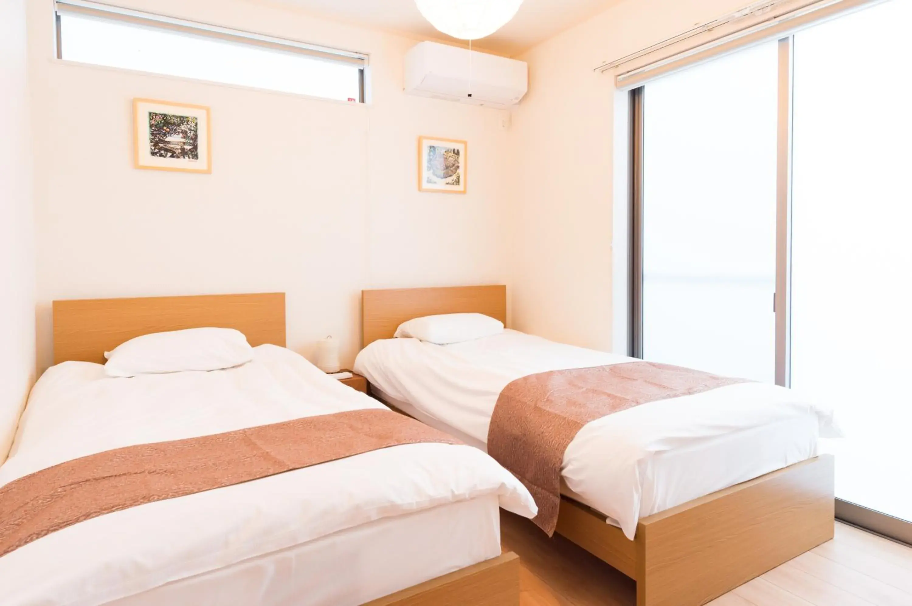 Bed in Riverside Yofuke AFP Villa Bed in Riverside Yofuke AFP Villa
