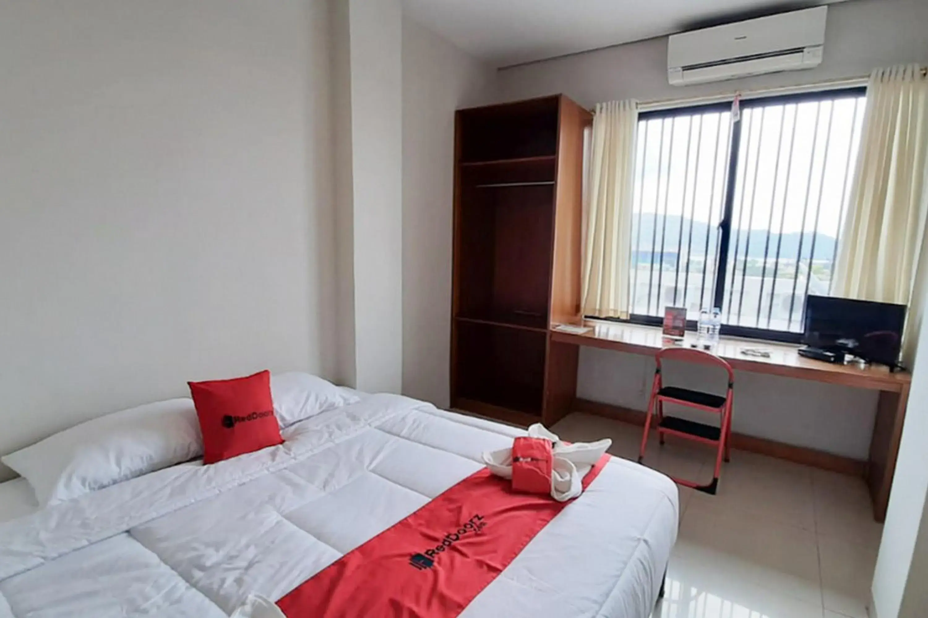 Bed in RedDoorz Plus @ Bitung City Center Bed in RedDoorz Plus @ Bitung City Center