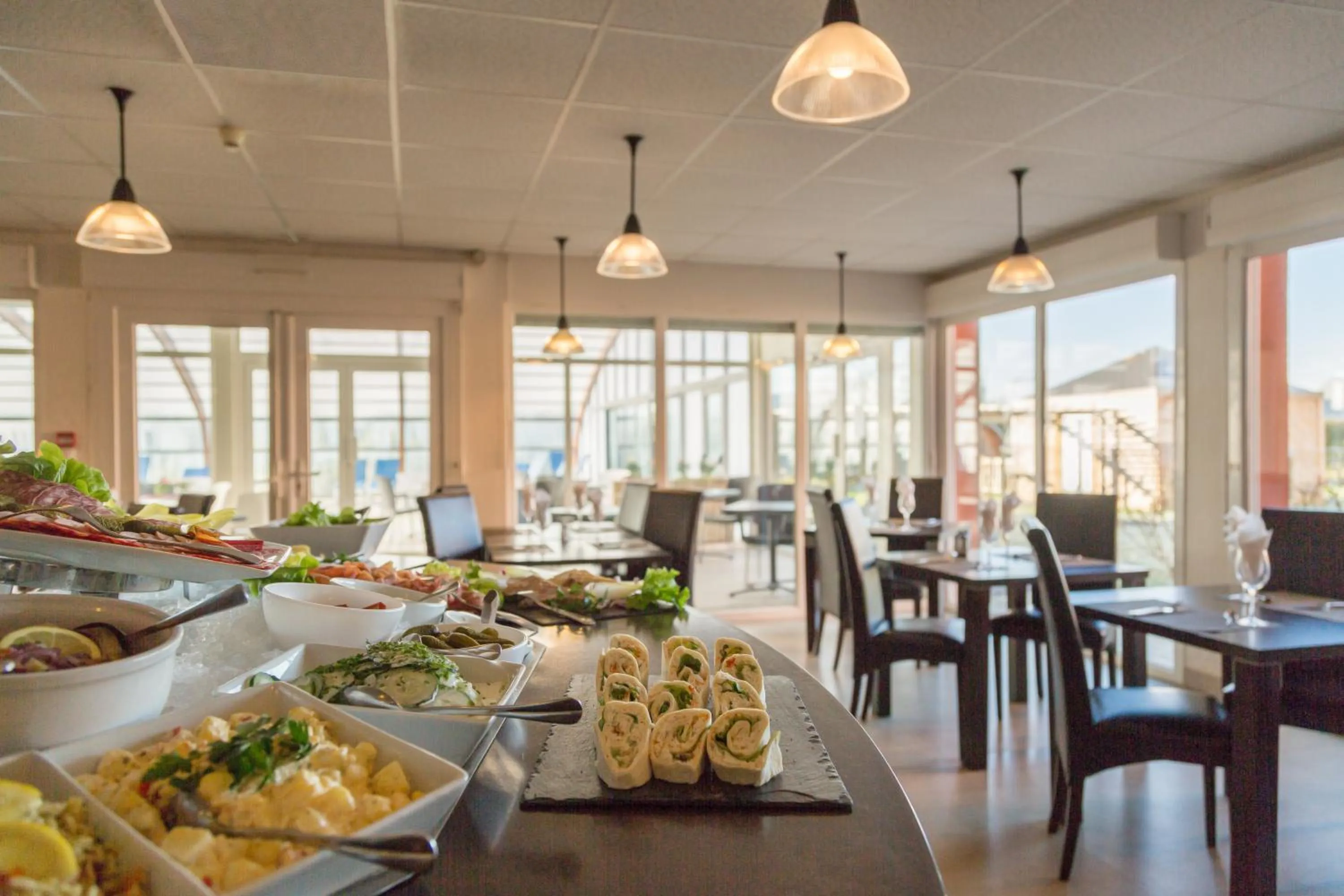 Restaurant/places to eat in The Originals Boutique Hôtel Spa Beuzeville Honfleur Sud