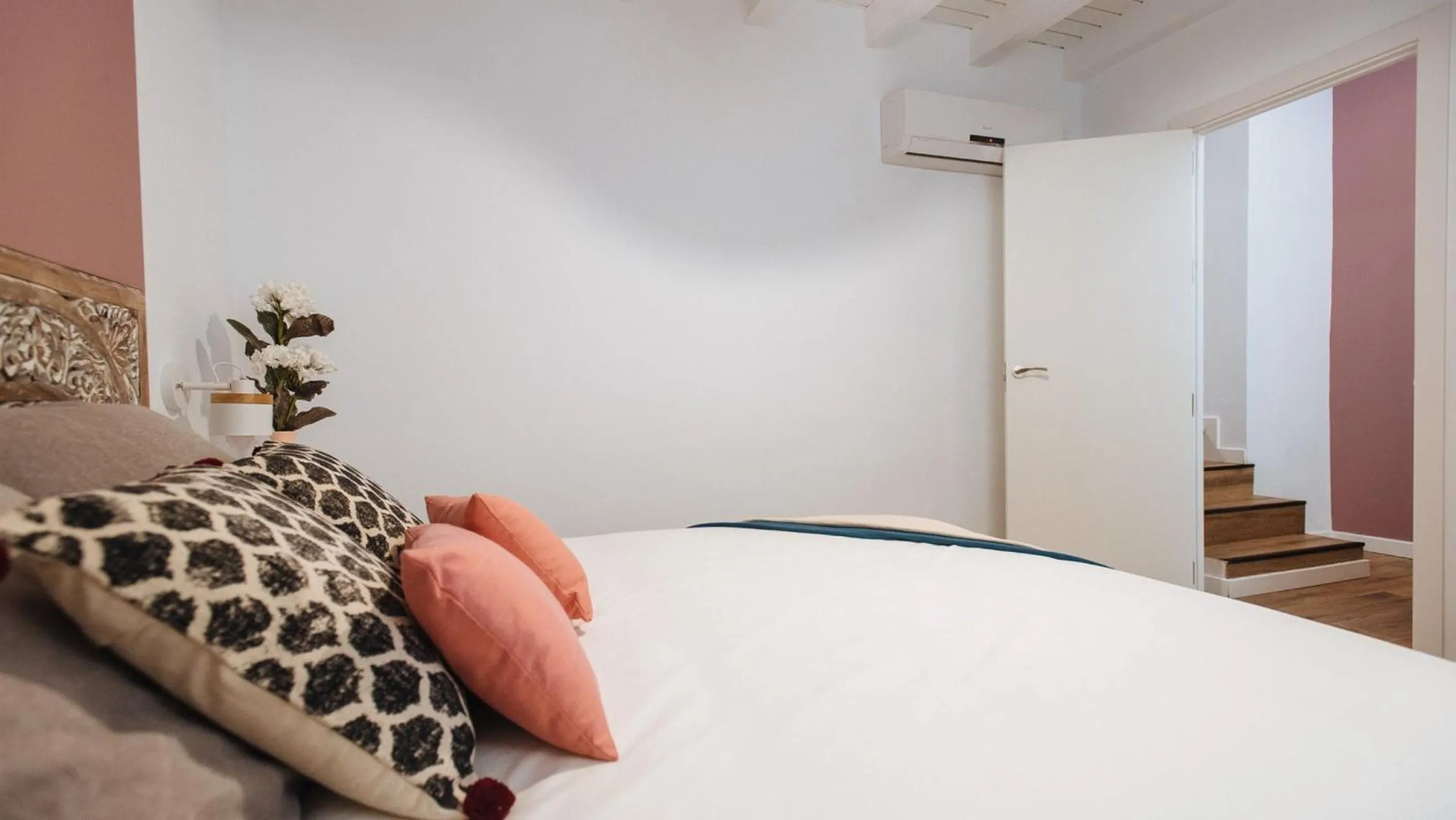Bed in Lola de Triana Apartments