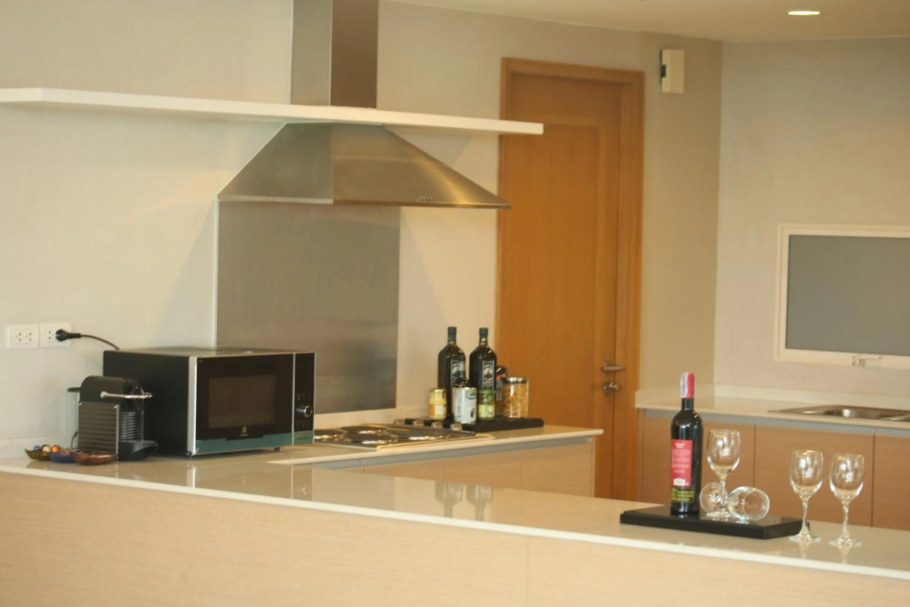 Kitchen or kitchenette in North Park Serviced Apartment Bangkok