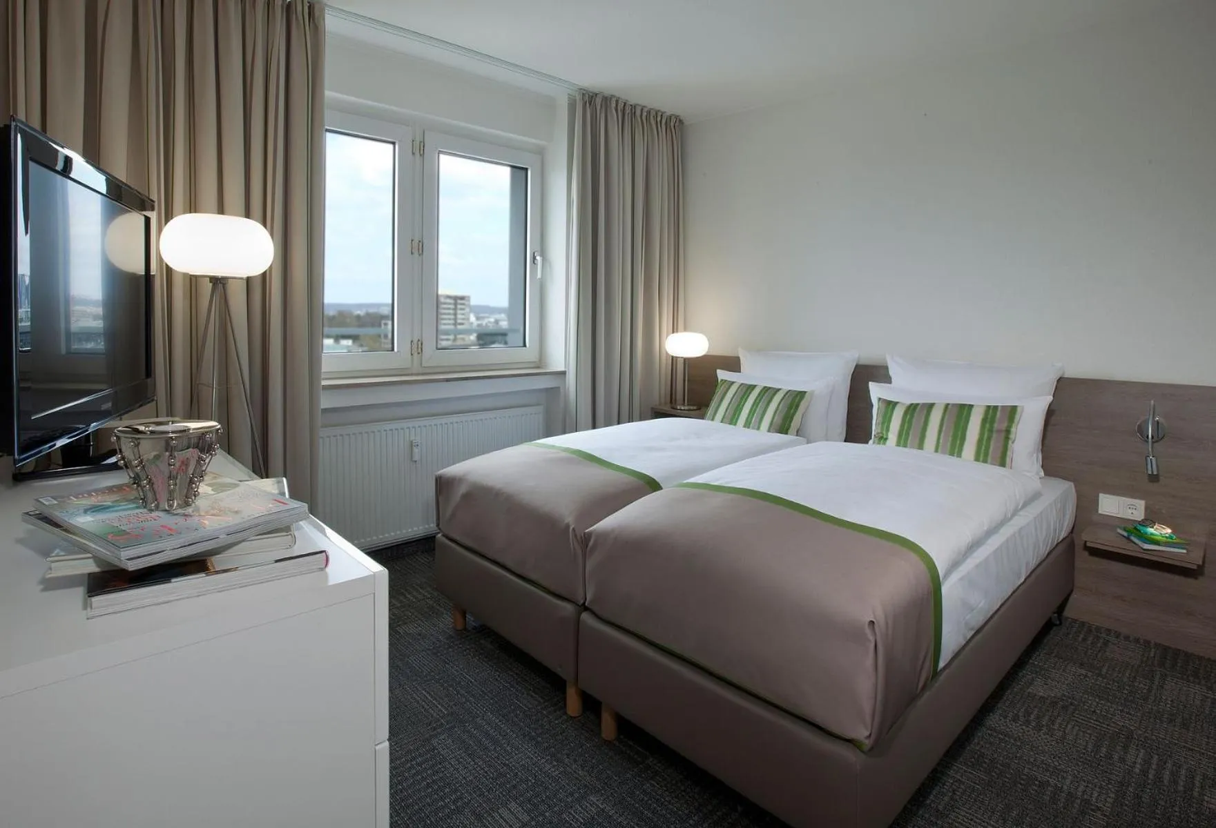 Bed in Messe Residence by Gerda Good Living - Digital Access