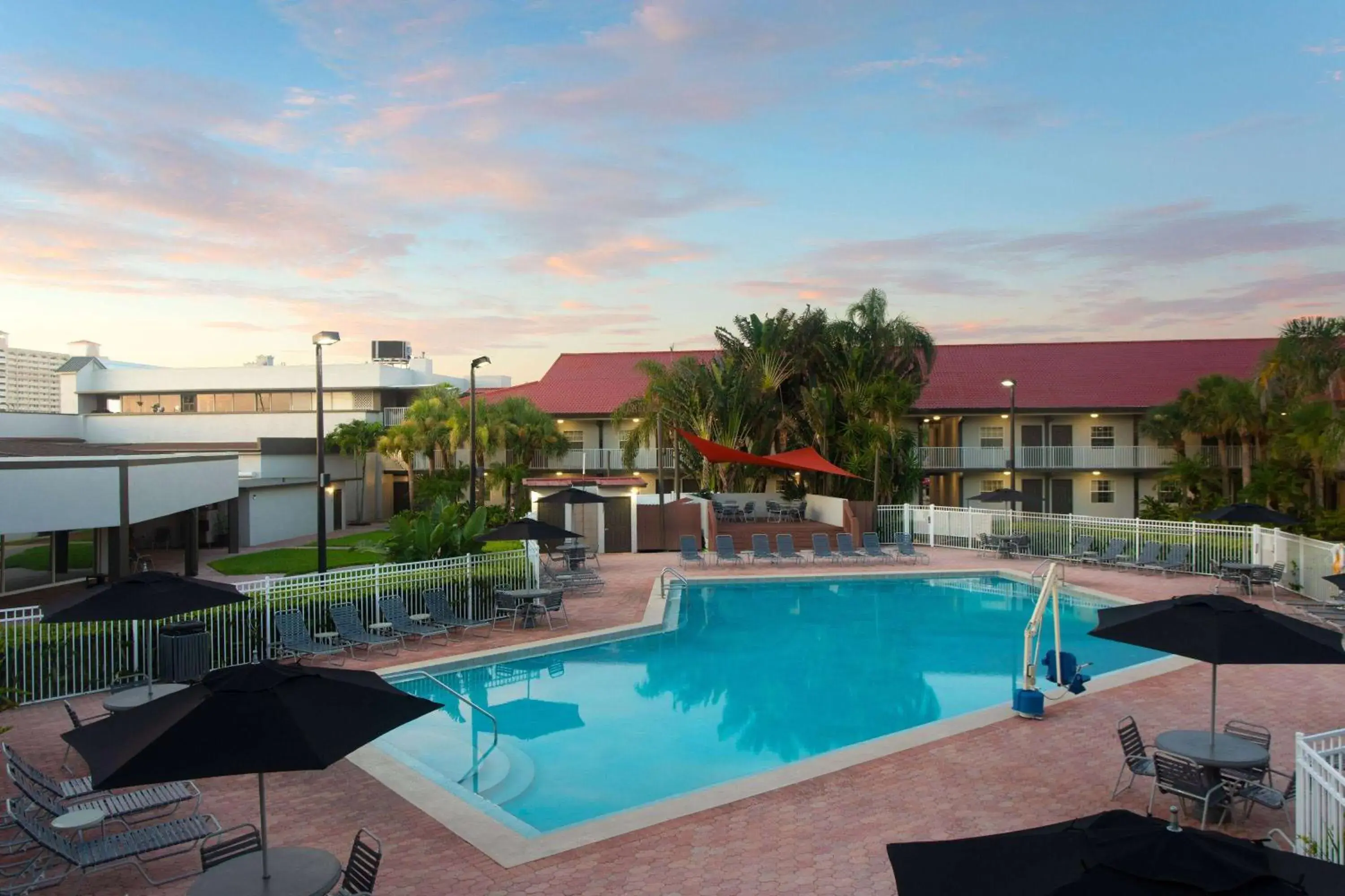 Swimming pool in La Quinta Inn by Wyndham Cocoa Beach-Port Canaveral Swimming pool in La Quinta Inn by Wyndham Cocoa Beach-Port Canaveral