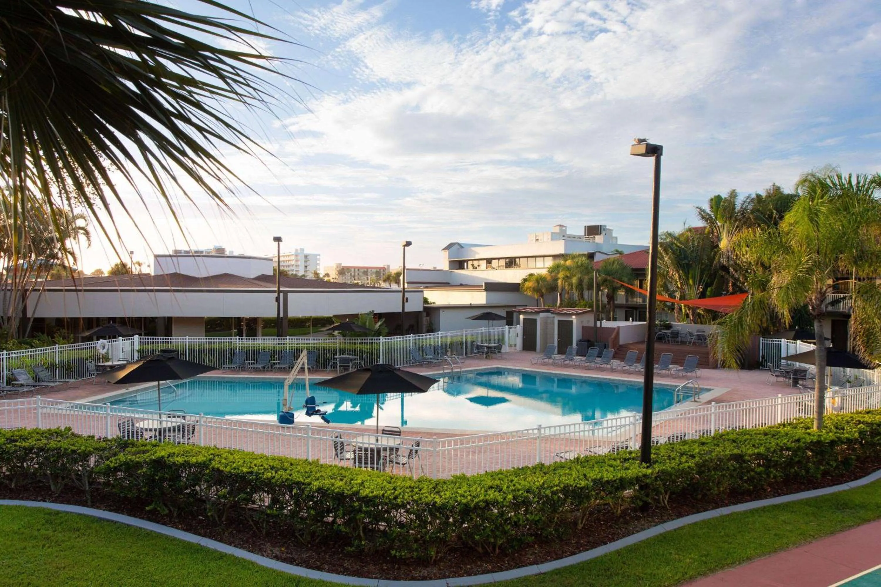 Swimming pool in La Quinta Inn by Wyndham Cocoa Beach-Port Canaveral