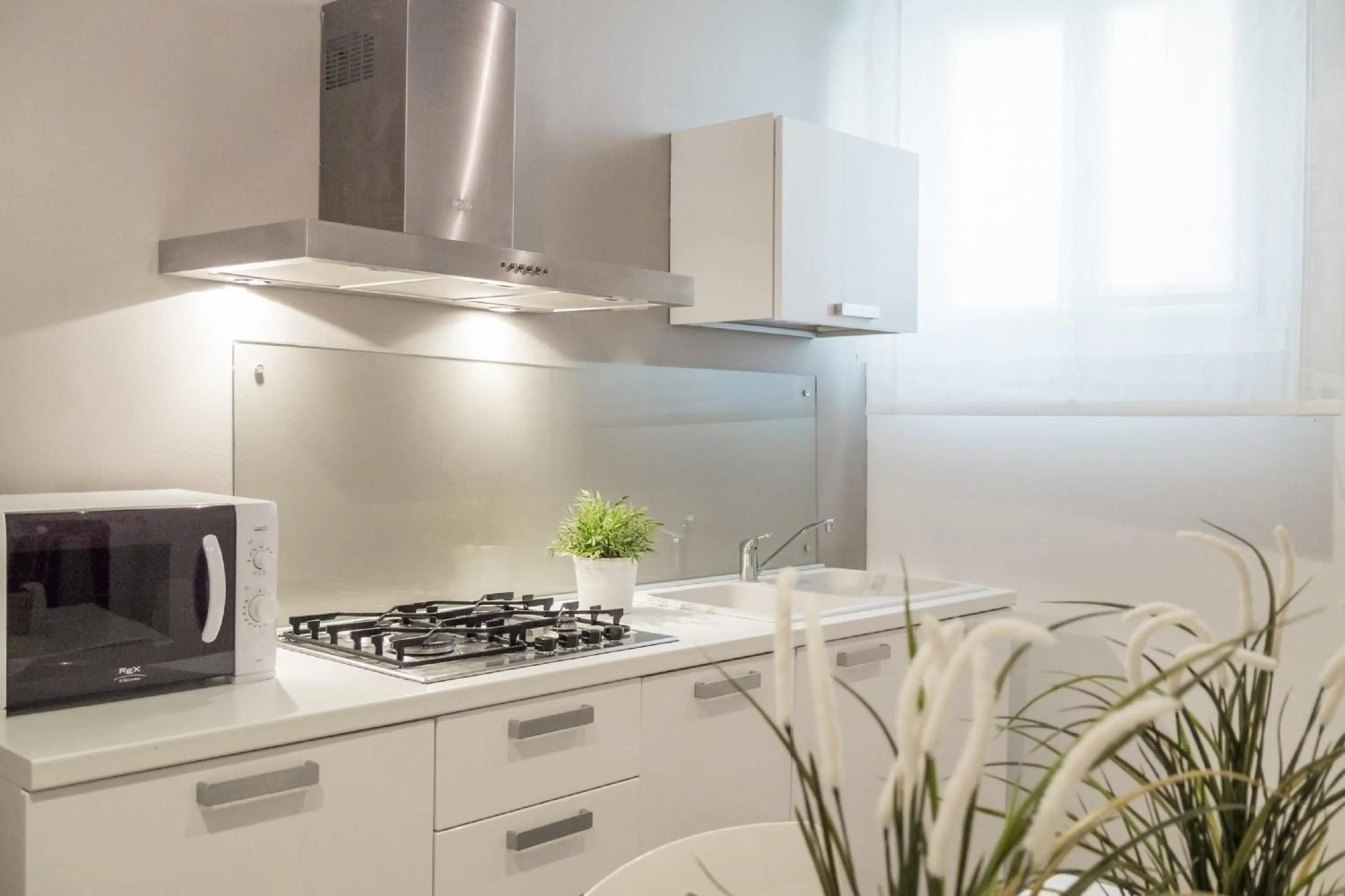 Kitchen or kitchenette in San Polo Design Apartments by Wonderful Italy