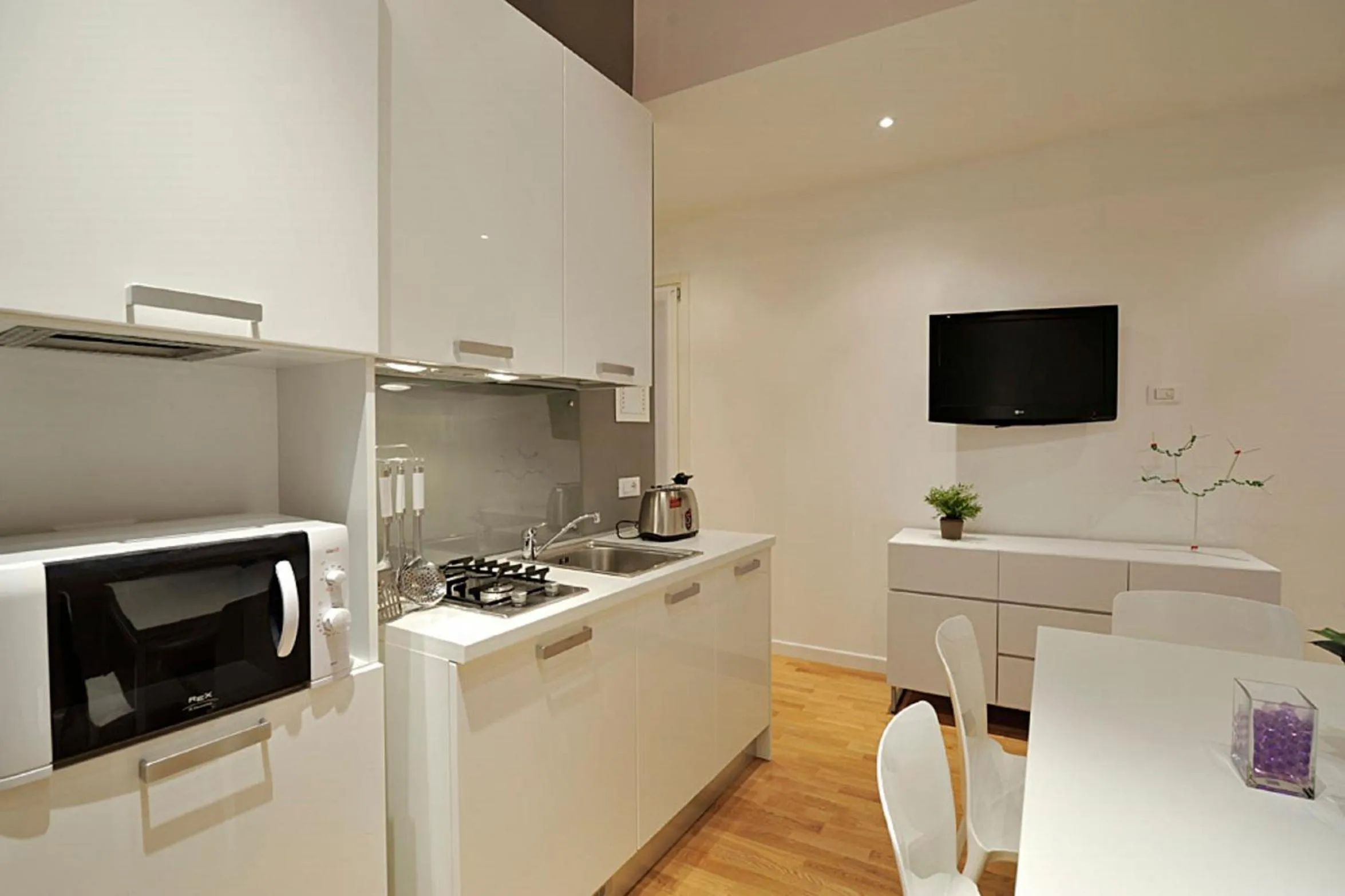 Kitchen or kitchenette in San Polo Design Apartments by Wonderful Italy