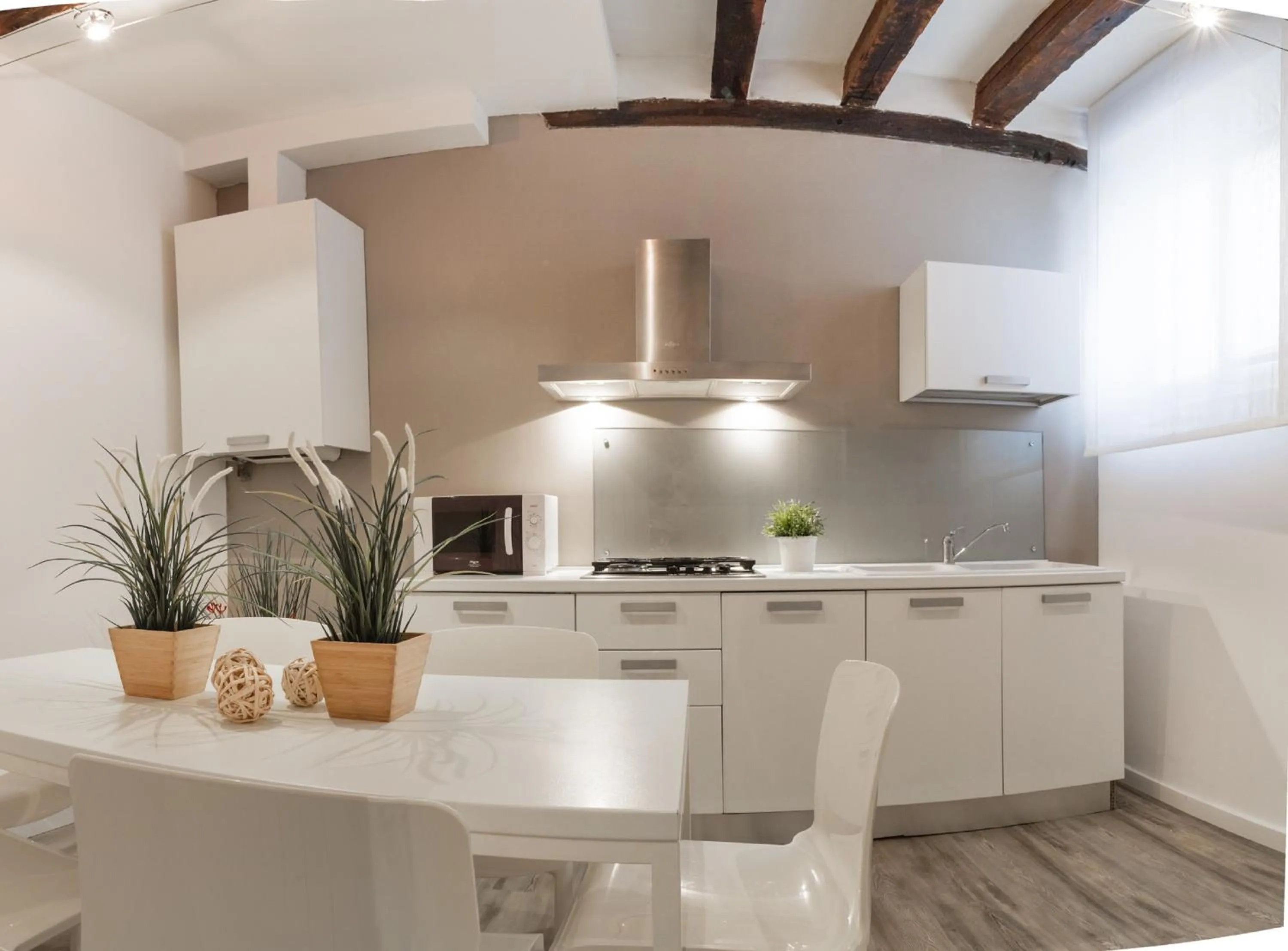 Kitchen or kitchenette in San Polo Design Apartments by Wonderful Italy