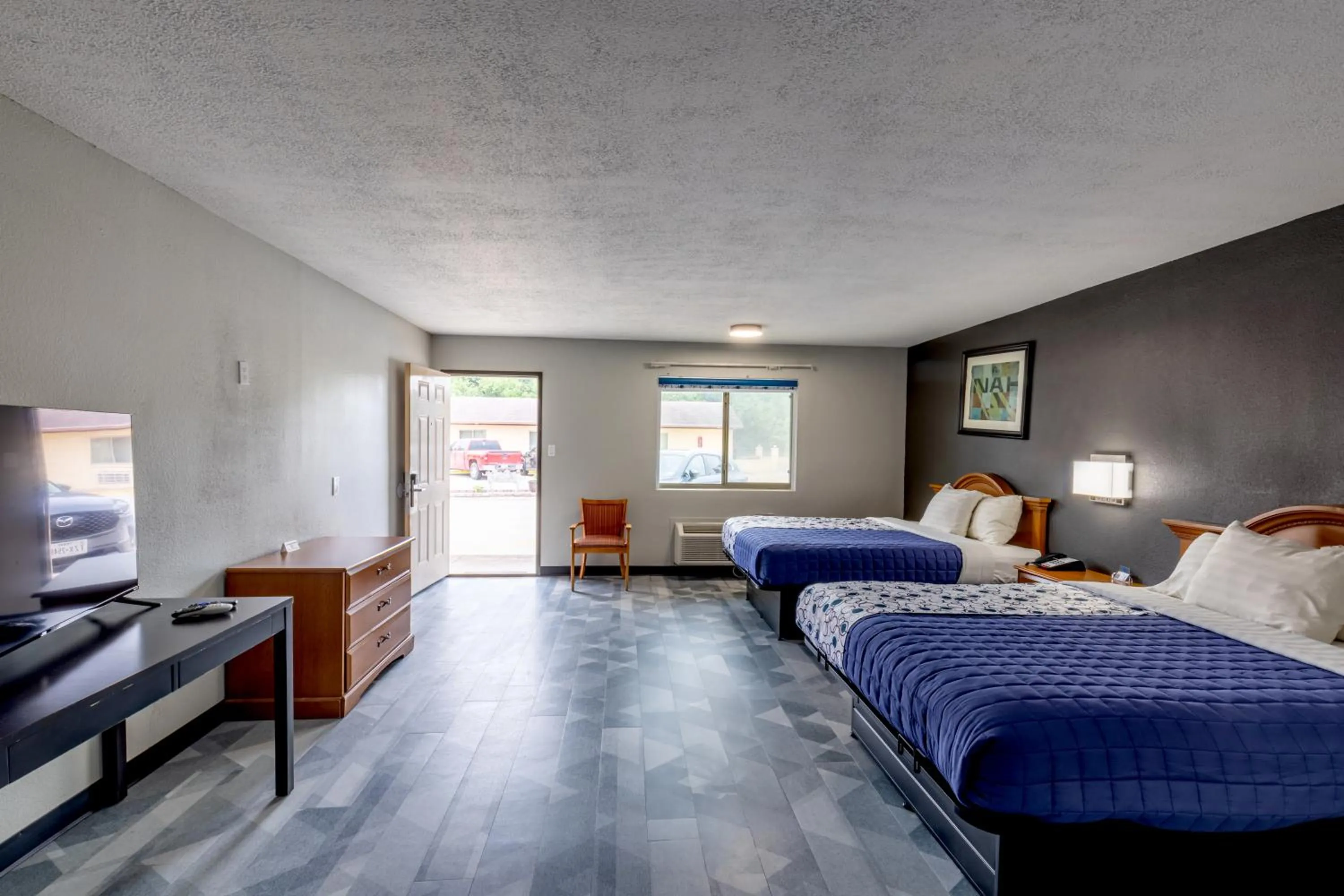 Bedroom, Bed in Freer Executive inn and Studios