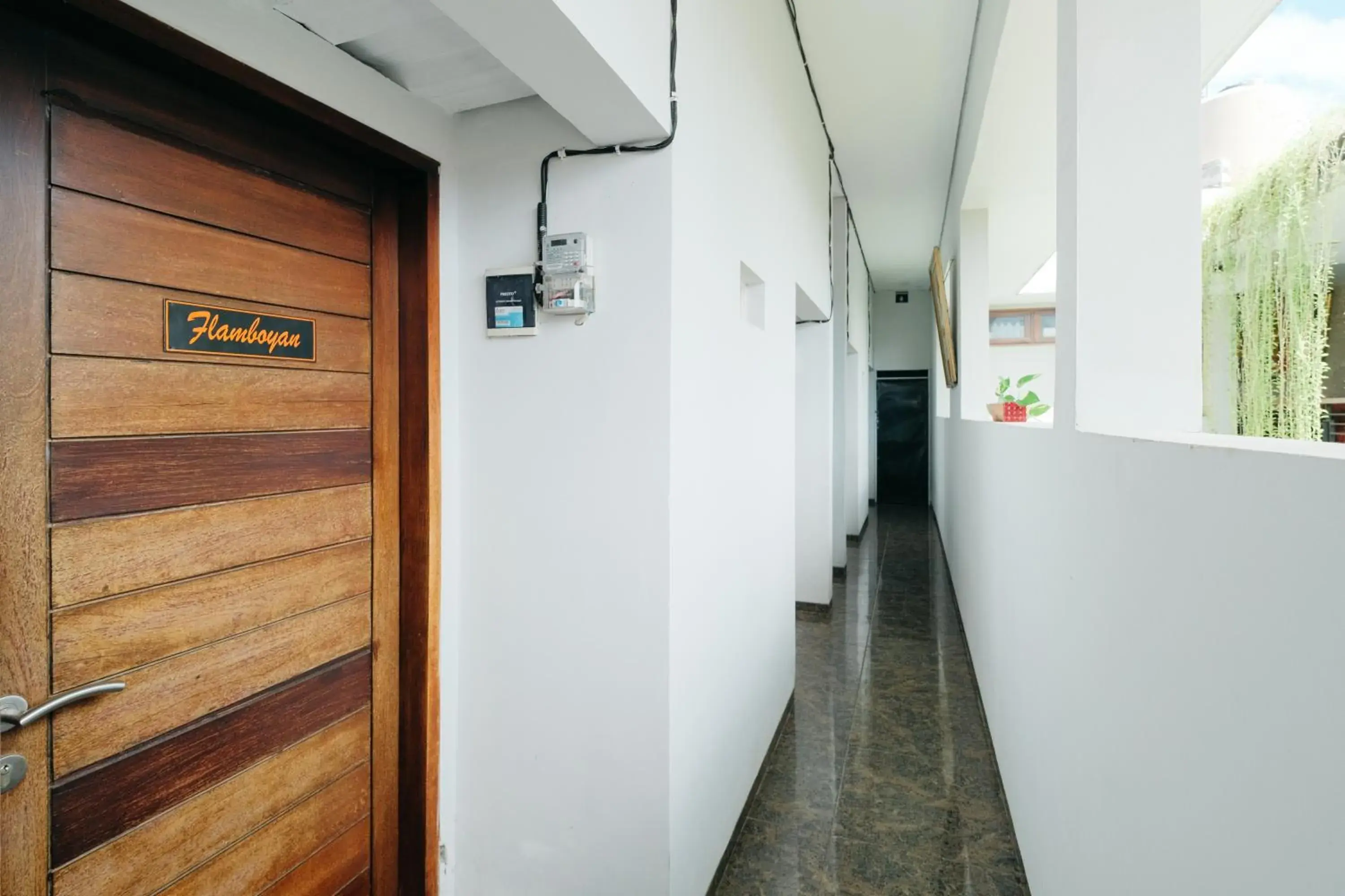 Facade/entrance in D' Tamblingan Guesthouse Jimbaran RedPartner Facade/entrance in D' Tamblingan Guesthouse Jimbaran RedPartner