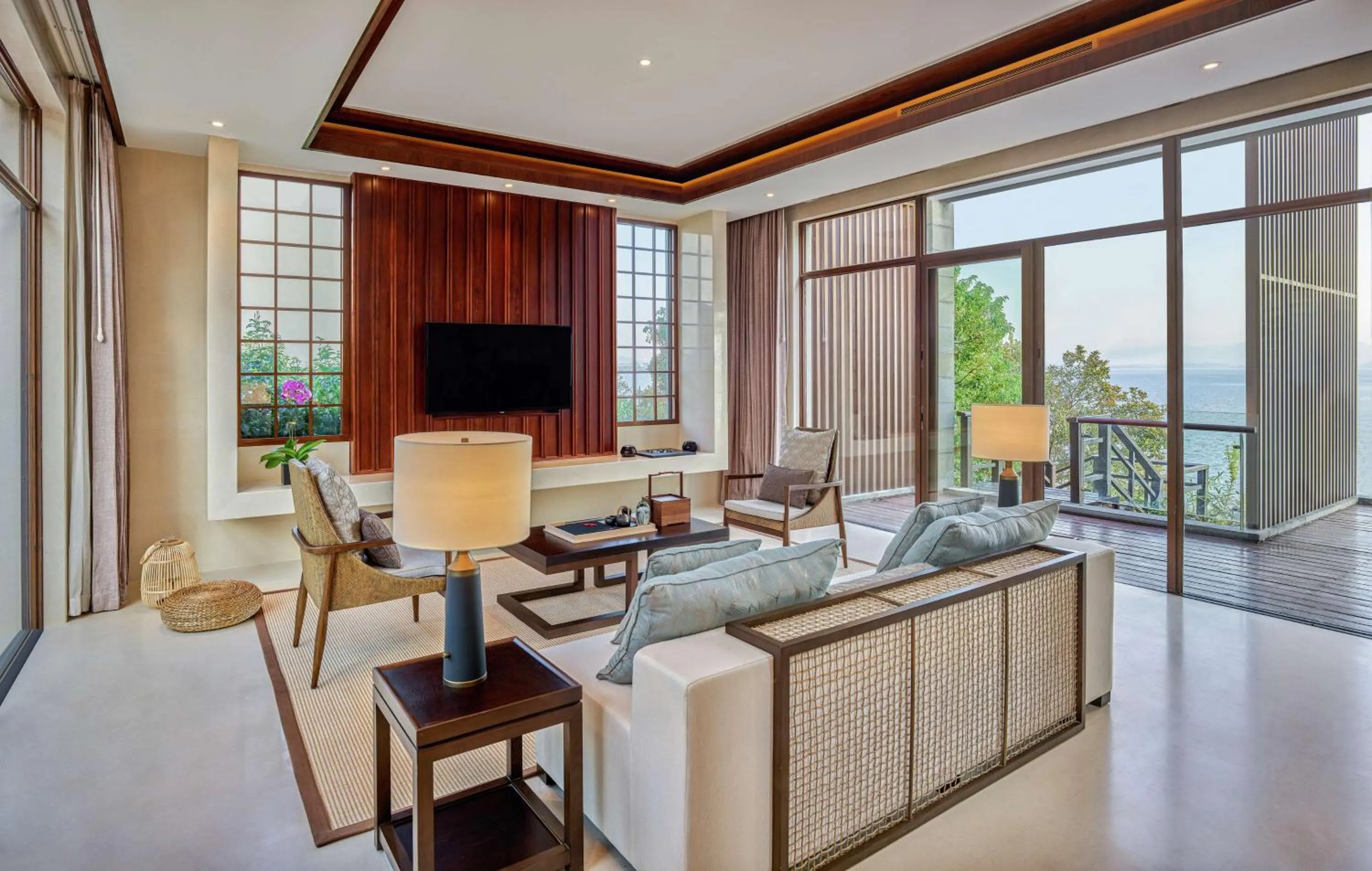 Living room in Lushan West Sea Resort, Curio Collection by Hilton