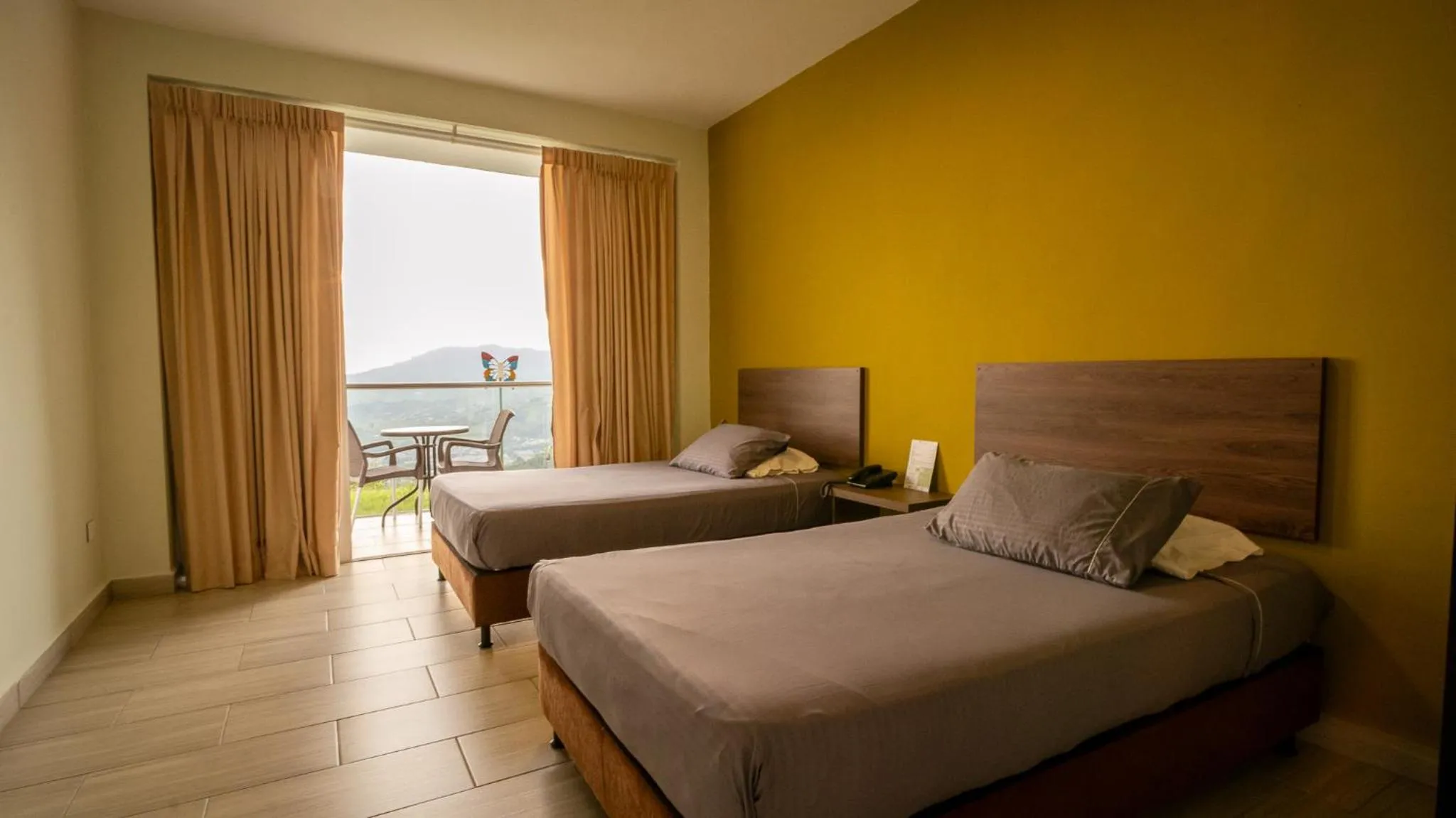 Balcony/Terrace, Bed in Hotel Entre Lomas