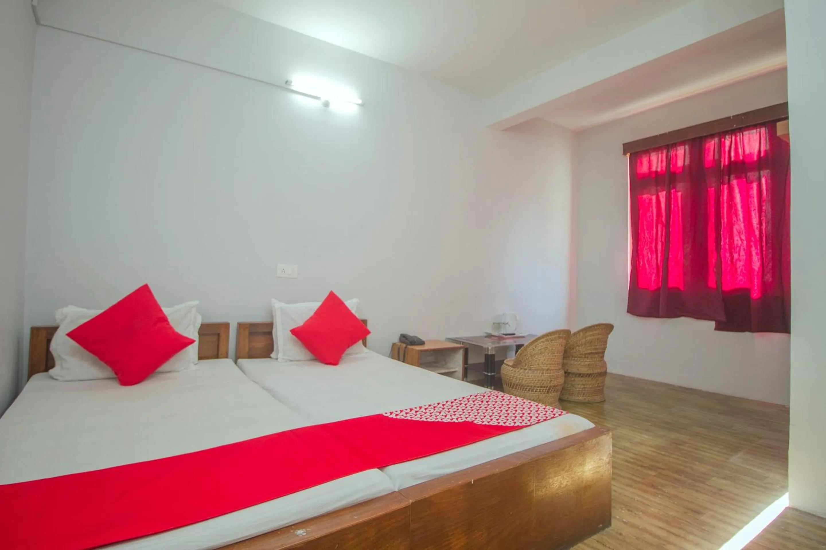 Bedroom in Hotel O Nourpem Residency