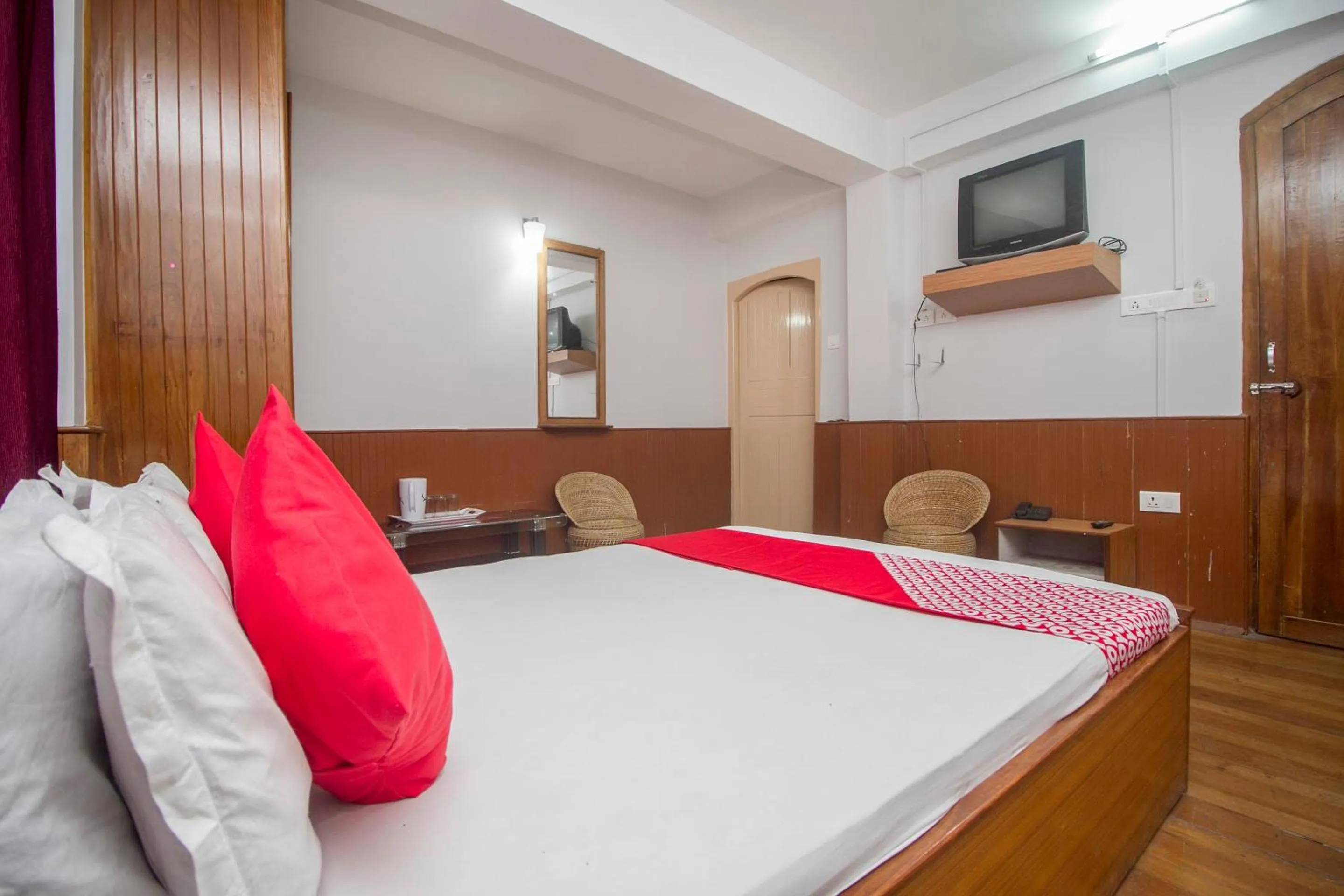 Bedroom in Hotel O Nourpem Residency