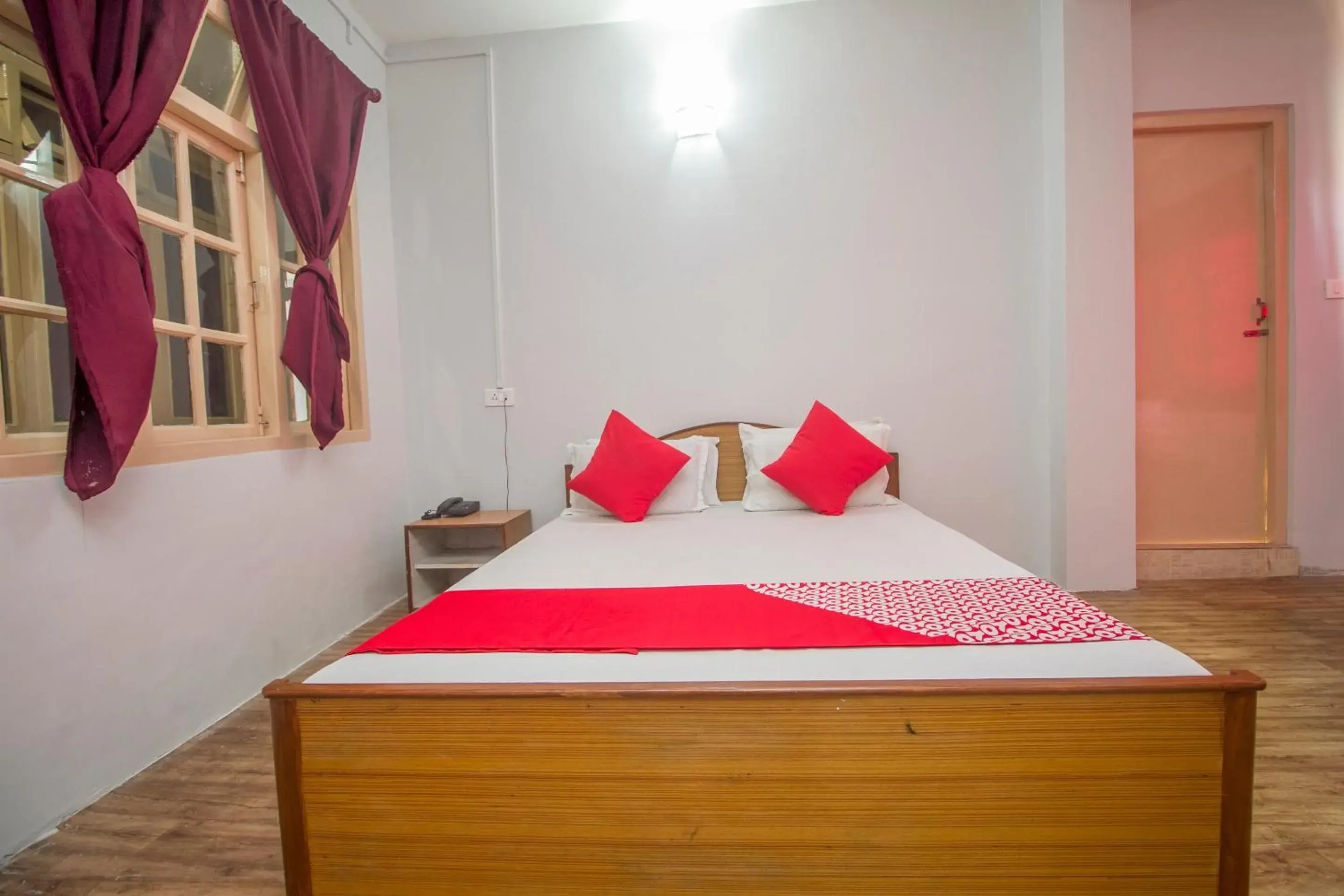 Bedroom in Hotel O Nourpem Residency Bedroom in Hotel O Nourpem Residency