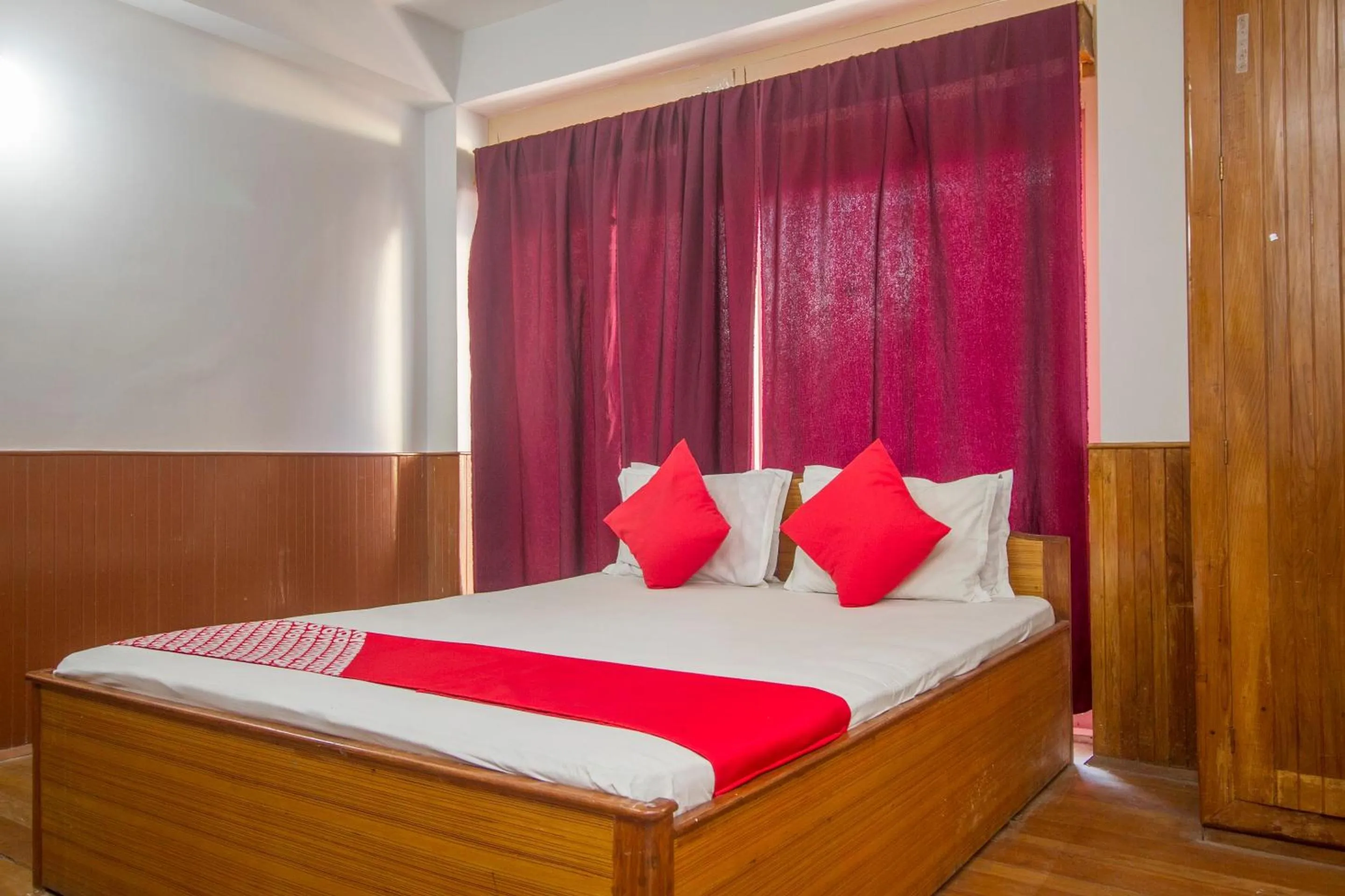 Bedroom in Hotel O Nourpem Residency