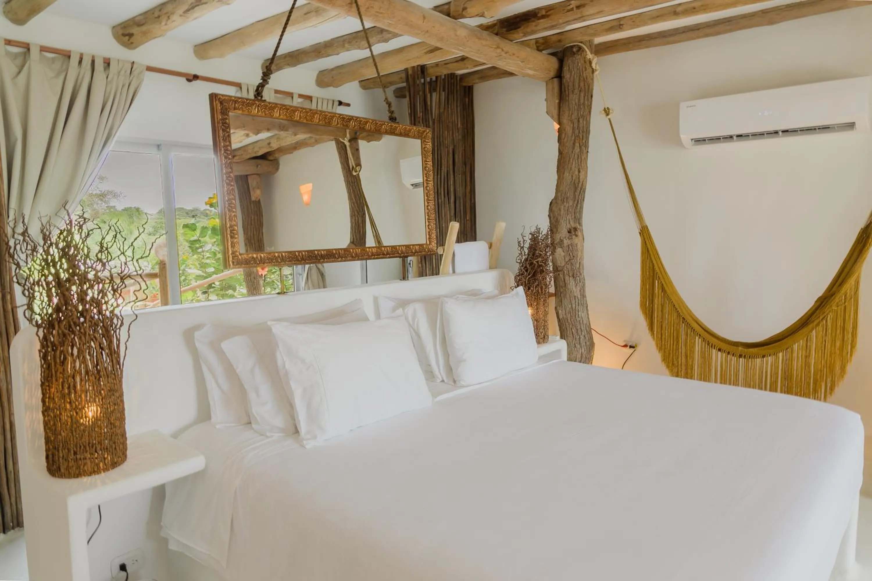 Bed in Éteka Slow Beach Hotel Adults Only