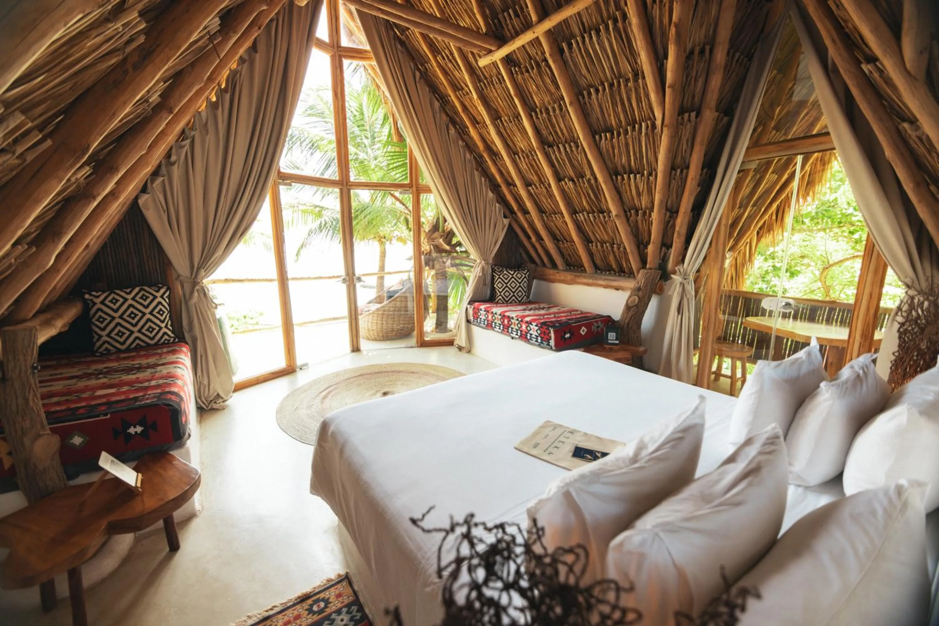 Bed in Éteka Slow Beach Hotel Adults Only